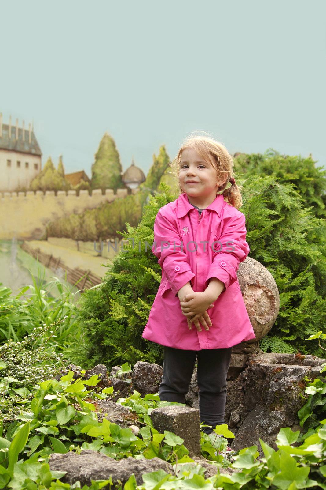 young girl posing in park by goce