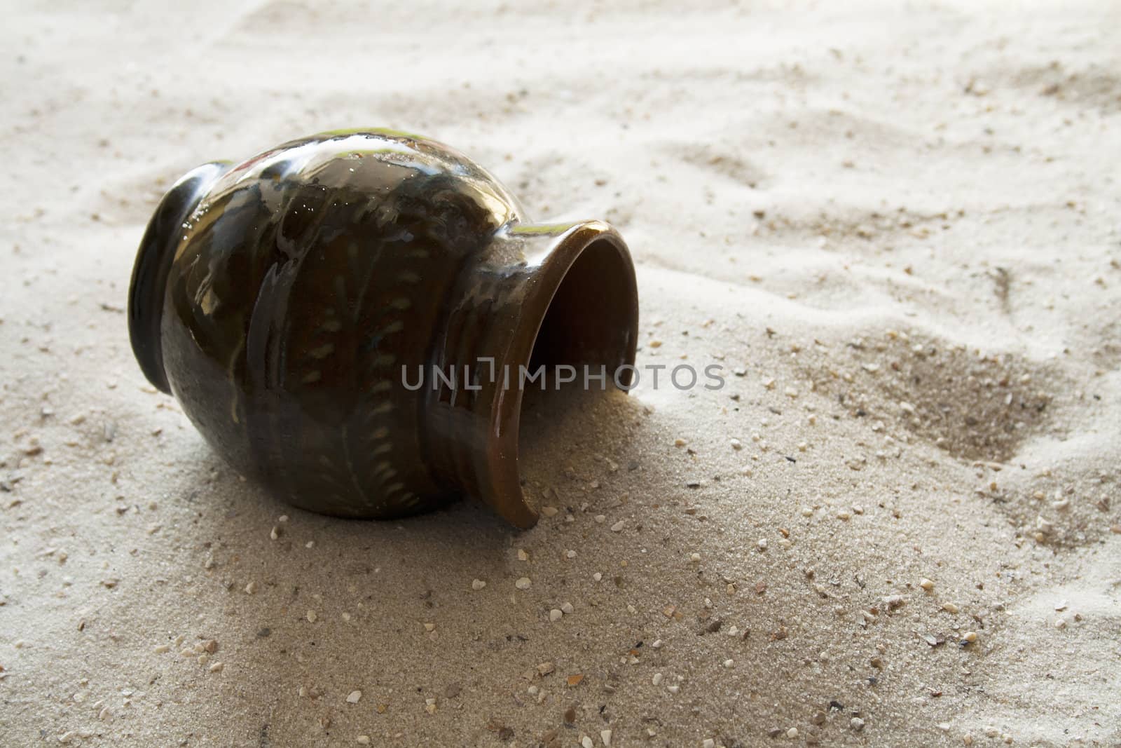 old pitcher, once worn in the water