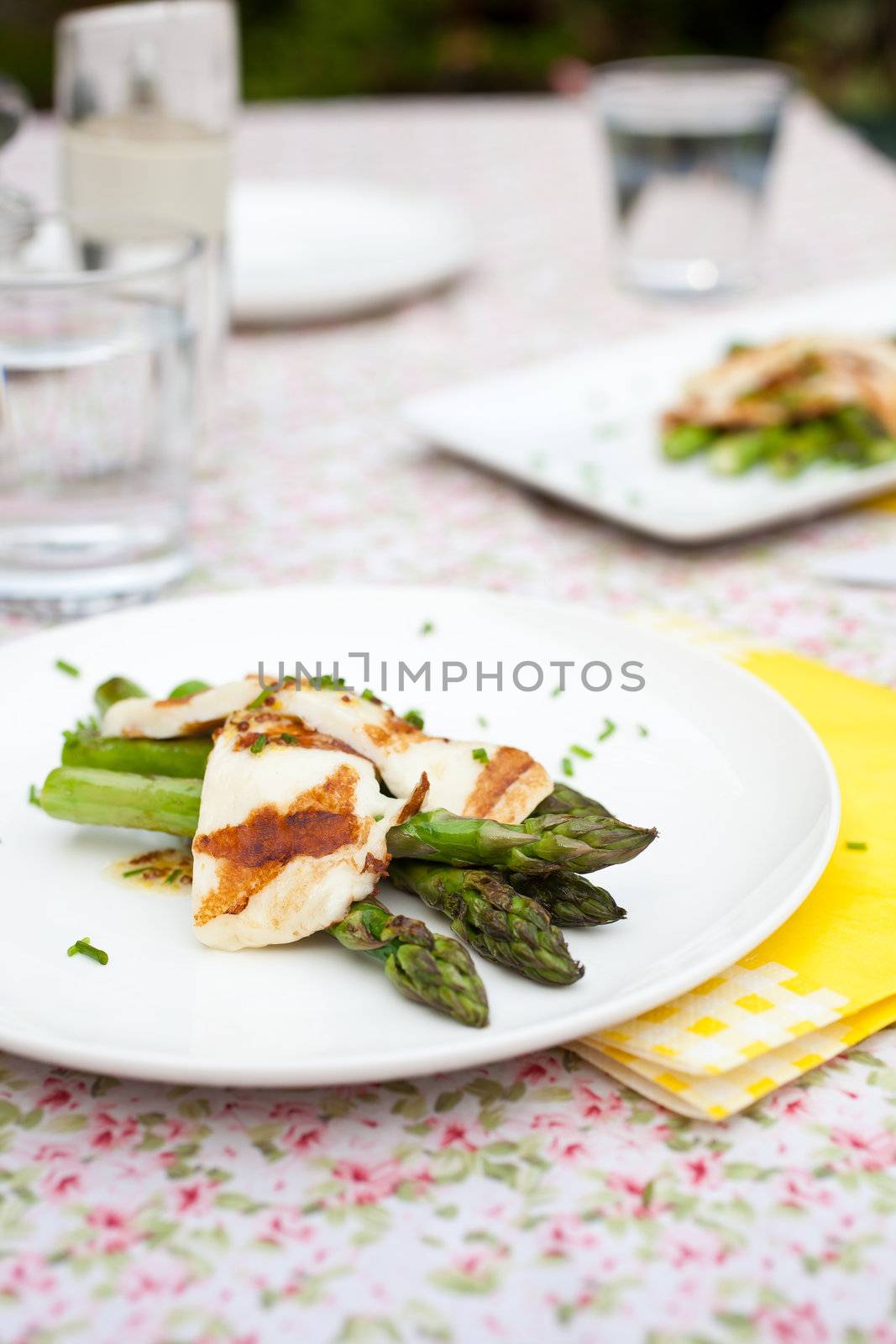 Fresh spring meal with asparagus and grilled haloumi cheese
