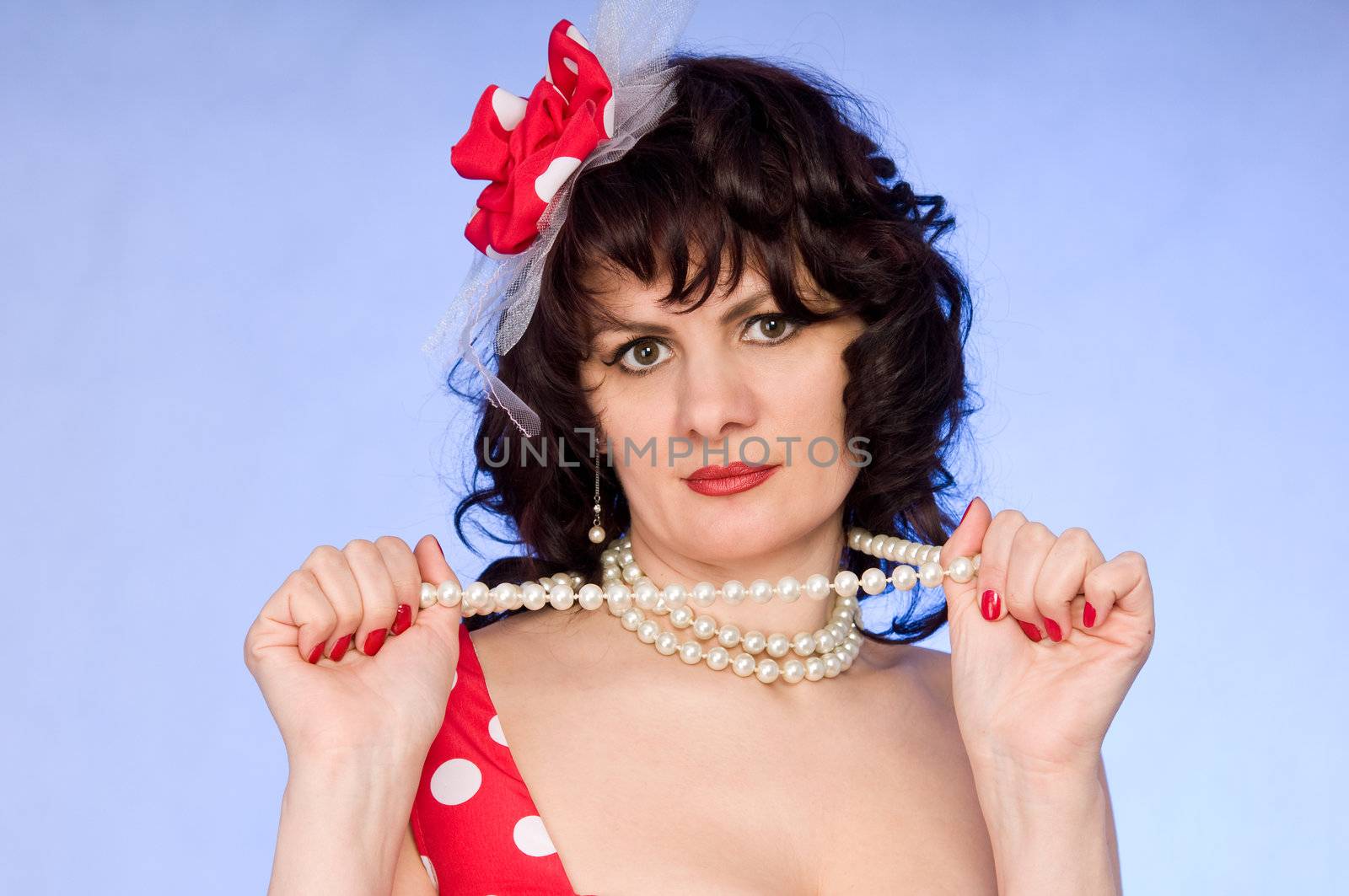 woman pin-up in red dress  on blue background