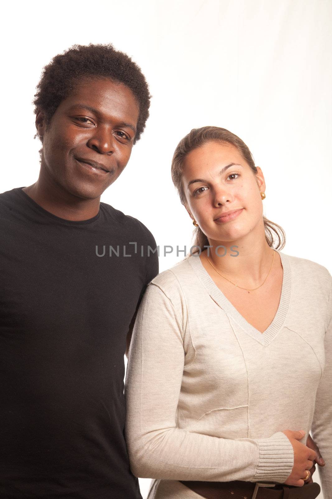 a multiracial couple posing together for the camera