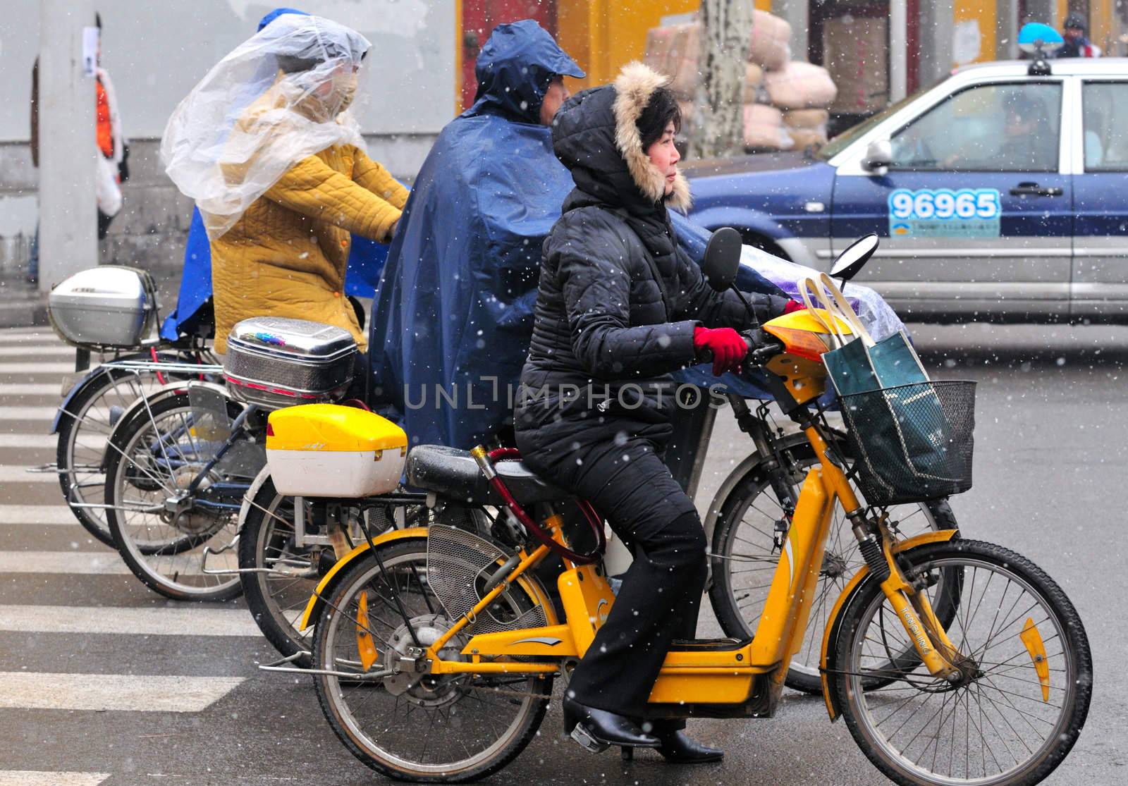 Chinese motorcyclists  by kobby_dagan