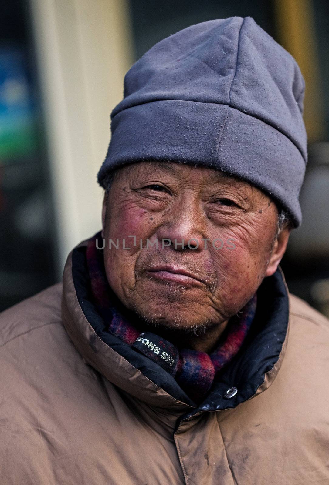 Portrait of old Chinese man in Shanghai China