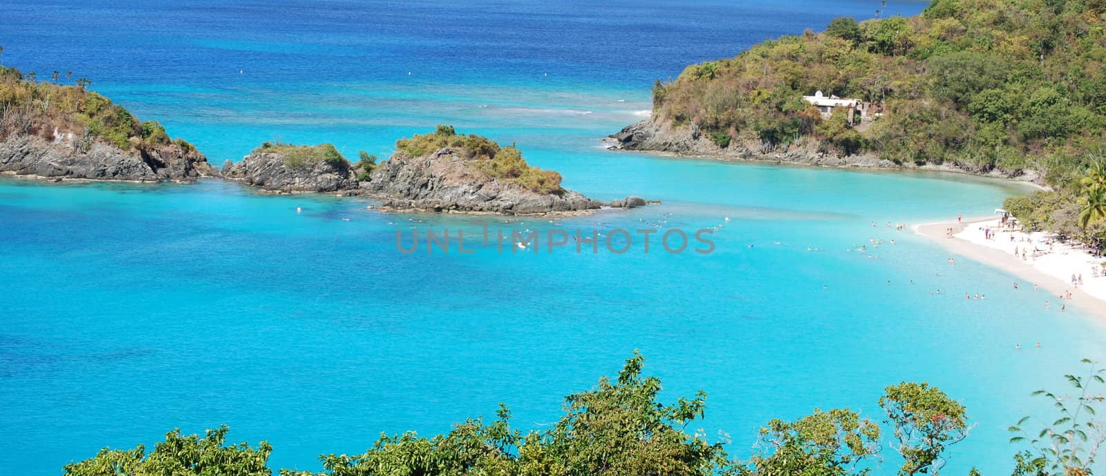 Bathers enjoy warm Caribbean waters.