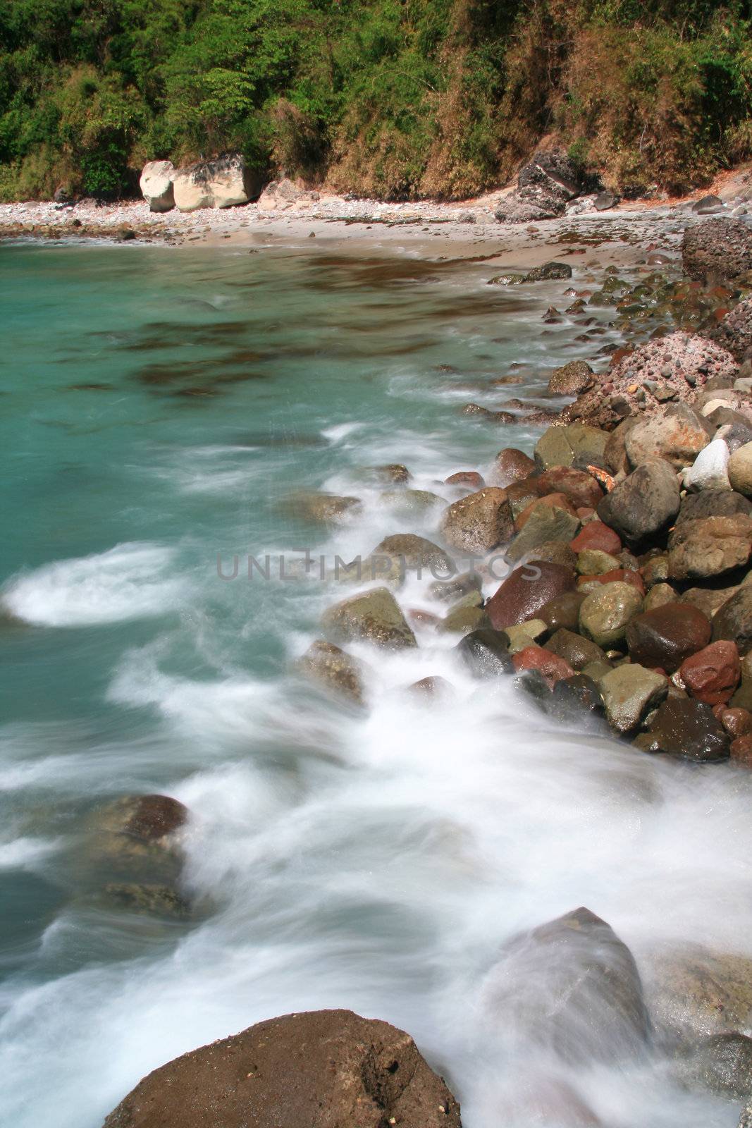 silky white water created by splashing waves 
