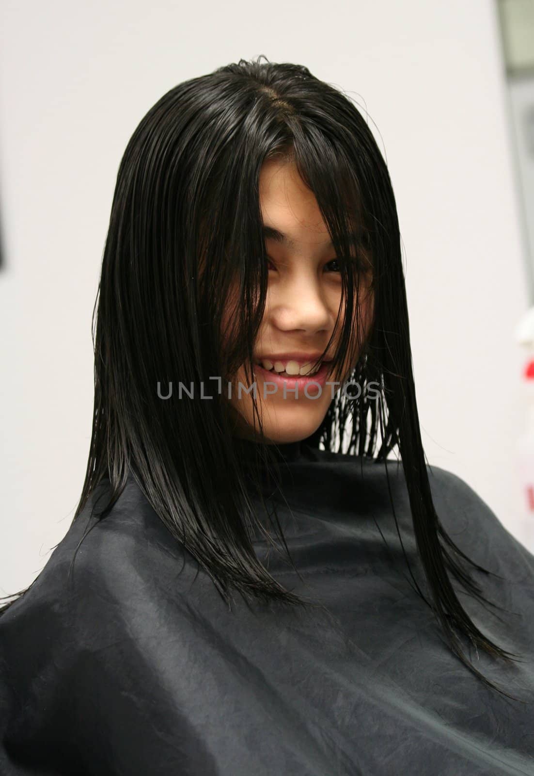 Young teen girl getting haircut by jarenwicklund