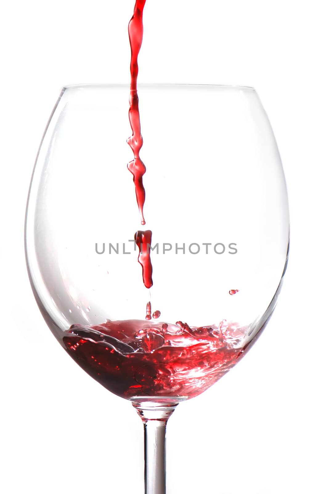 Pouring wine isolated on white background