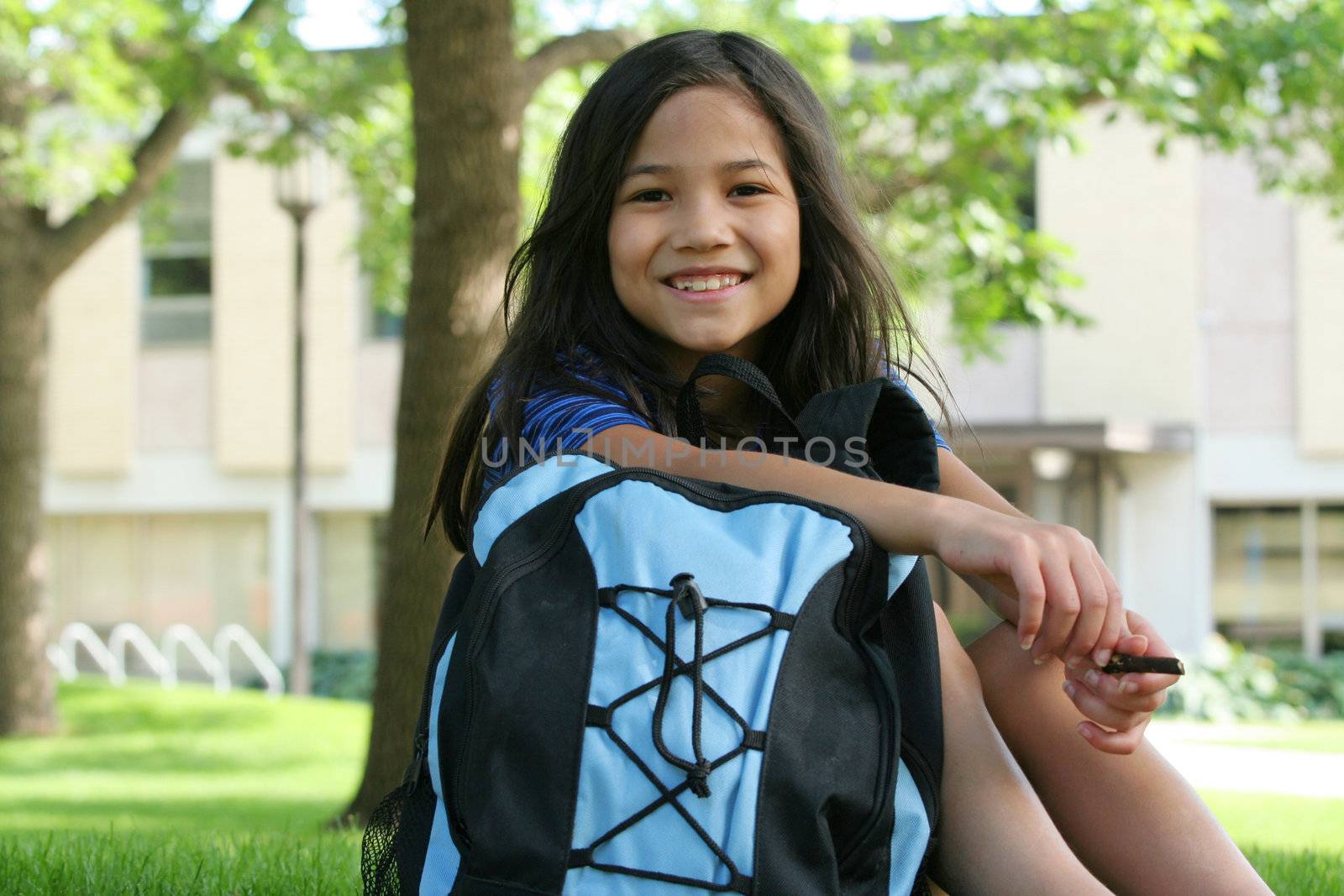 Eight year old girl excited about first day of school