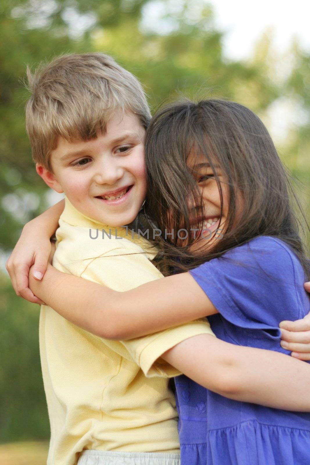 Best friends hugging, multicultural friendships, diversity