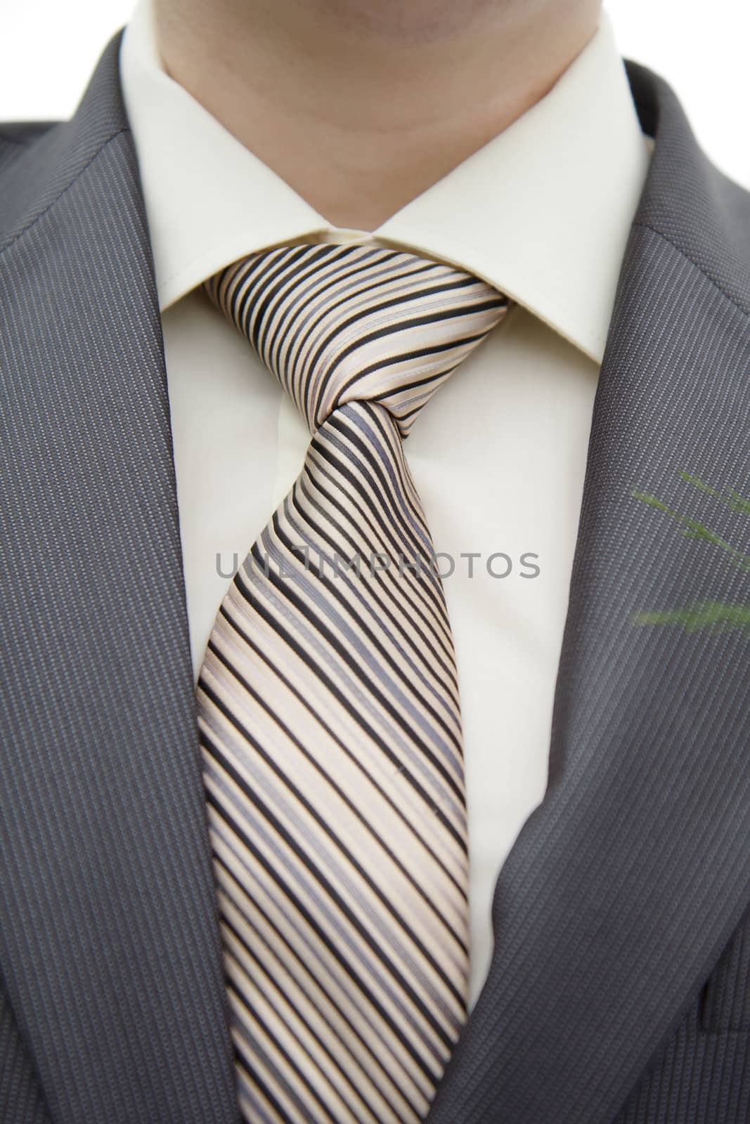 beige shirt, jacket and tie groom close
