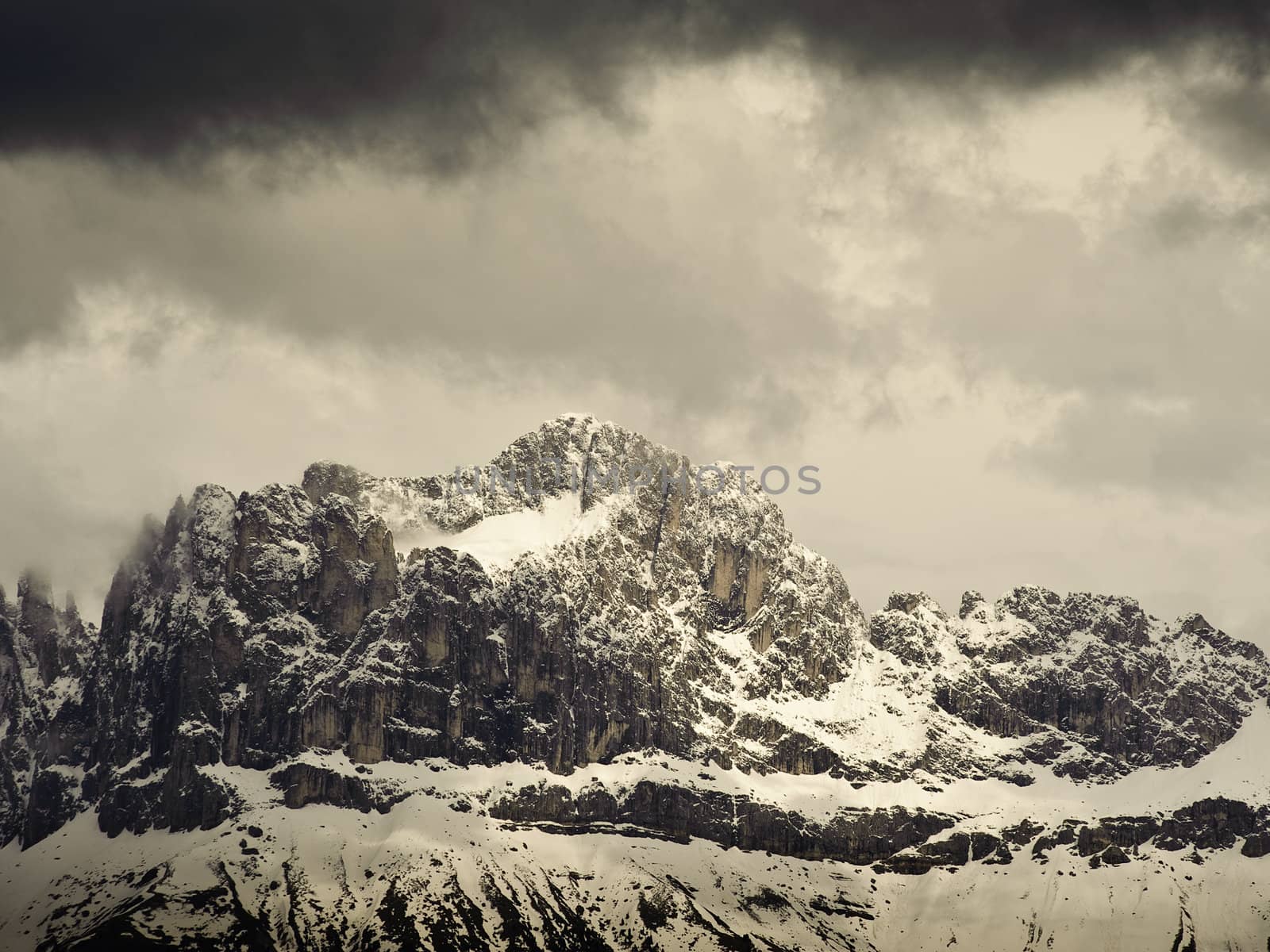 Mountain Range in South Tyrol with dramatic clouds