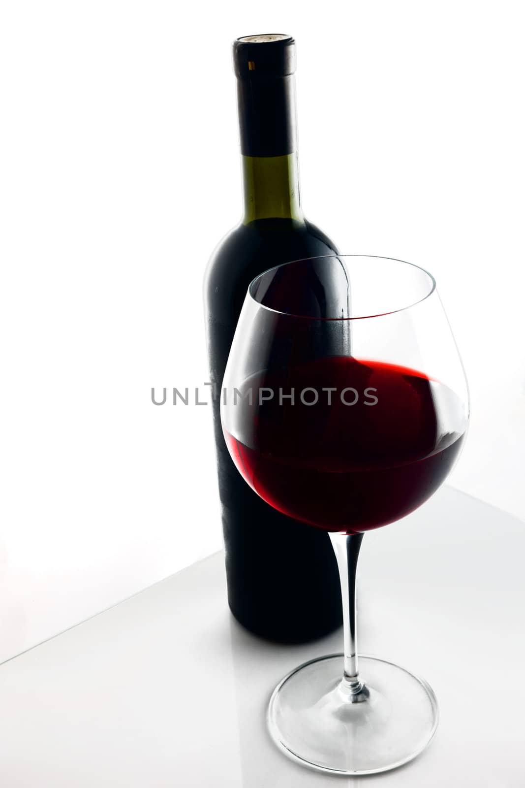  Glass and Bottle of red wine. by vladimir_sklyarov