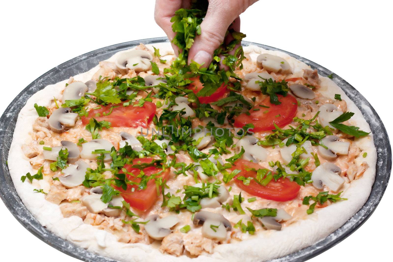 Preparation of vegetarian pizza isolated on white background