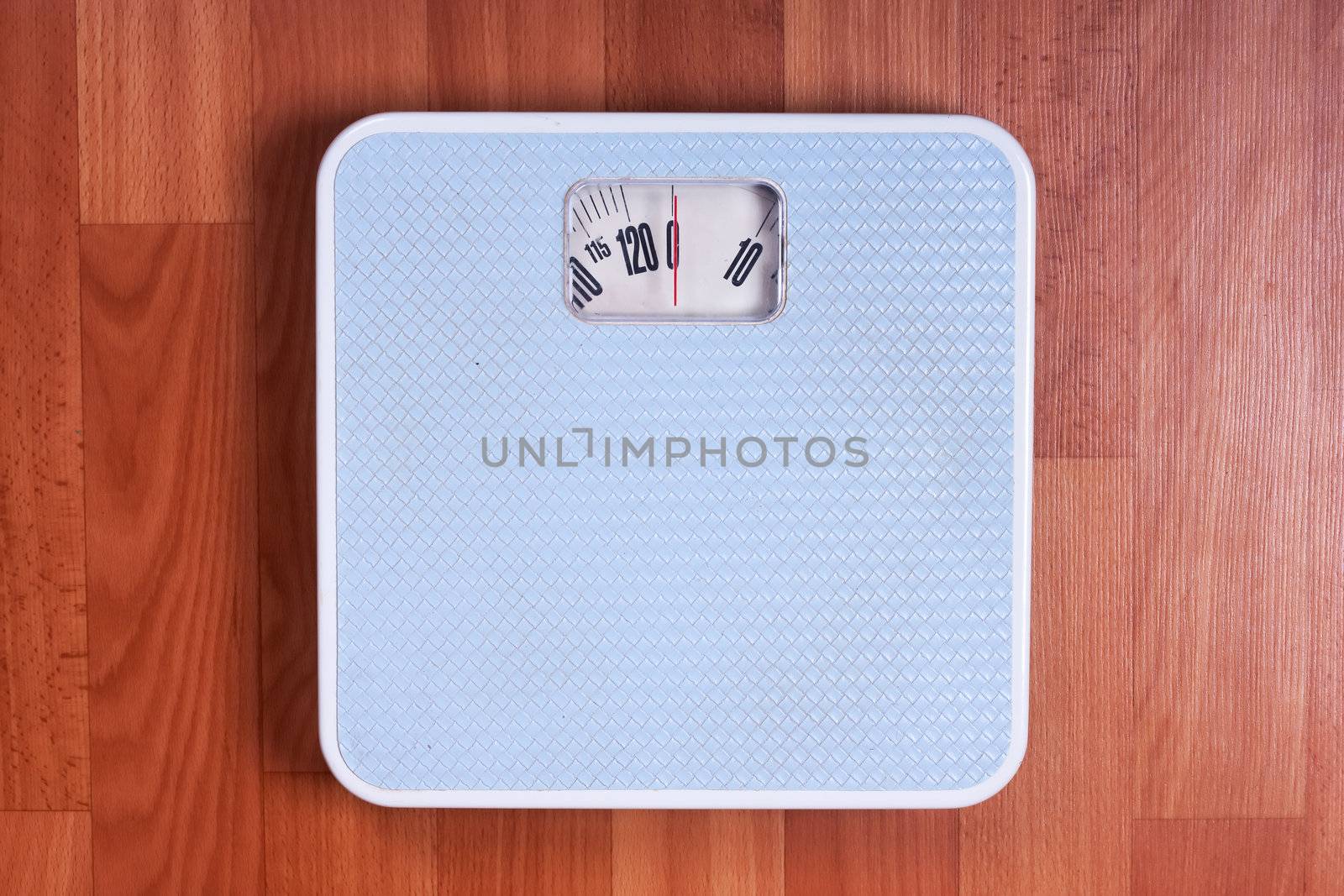 Closeup view of scales on a floor. Dieting concept.