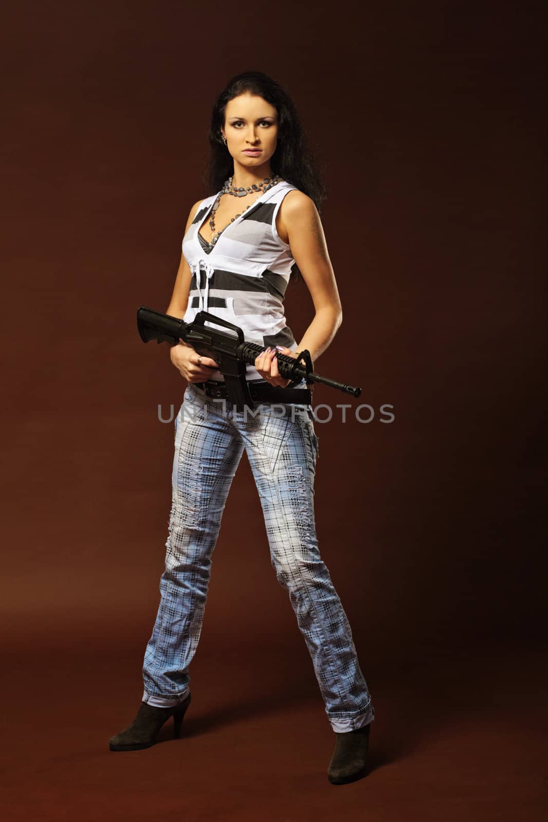 Beautiful woman with a rifle by pzaxe