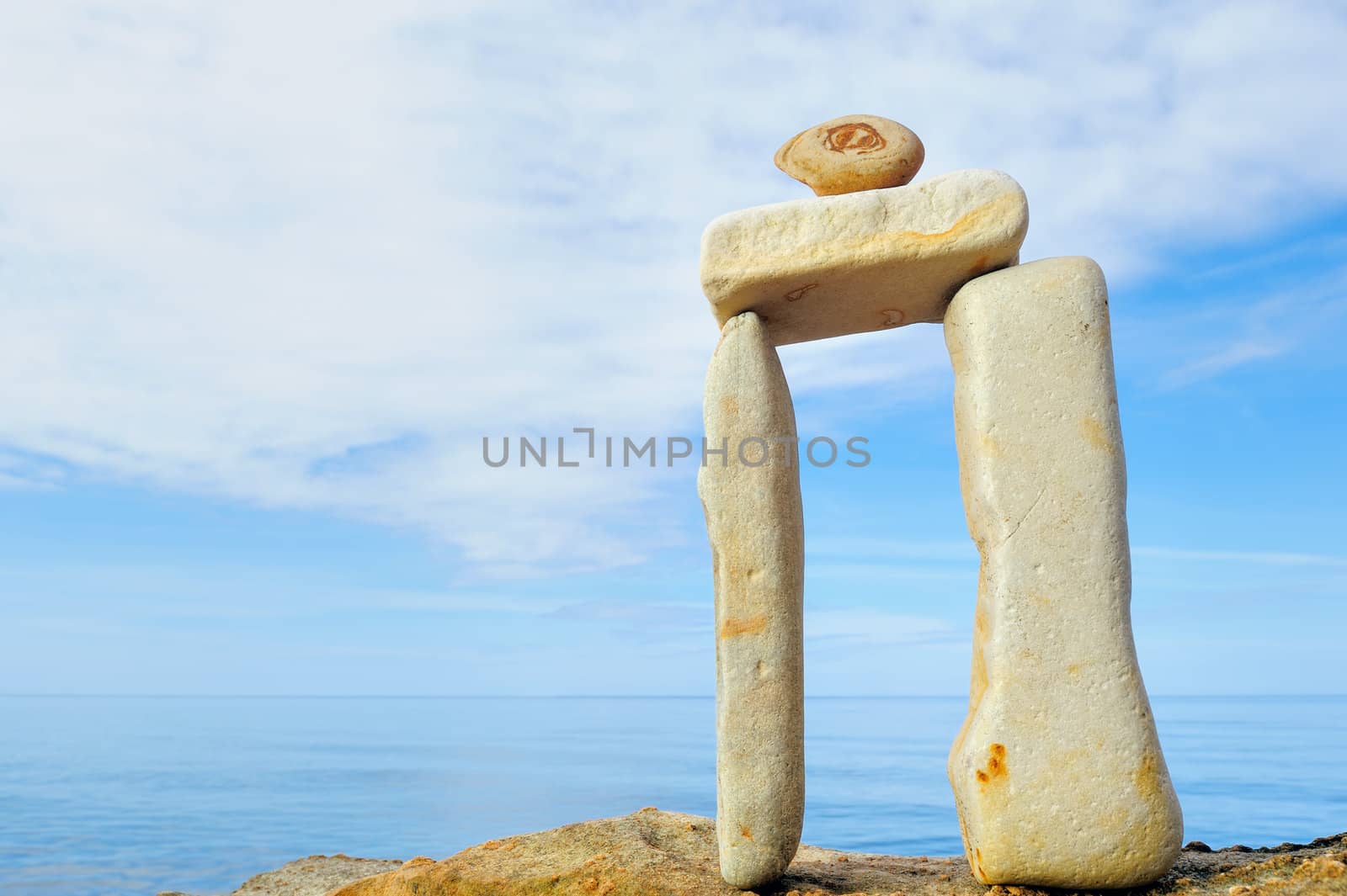 Balancing of longest pebbles on the sea coast