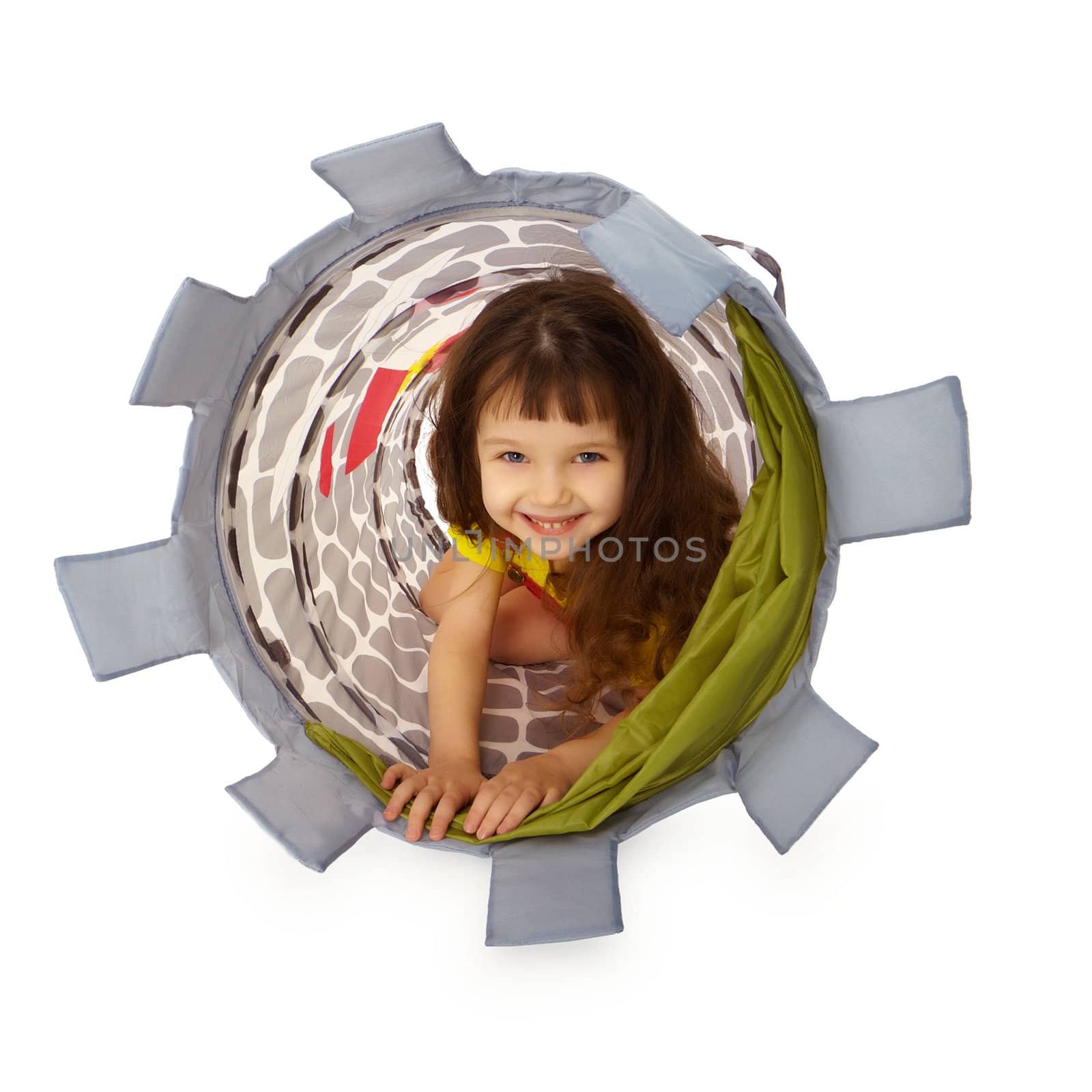 A little girl hiding inside the basket isolated on white background