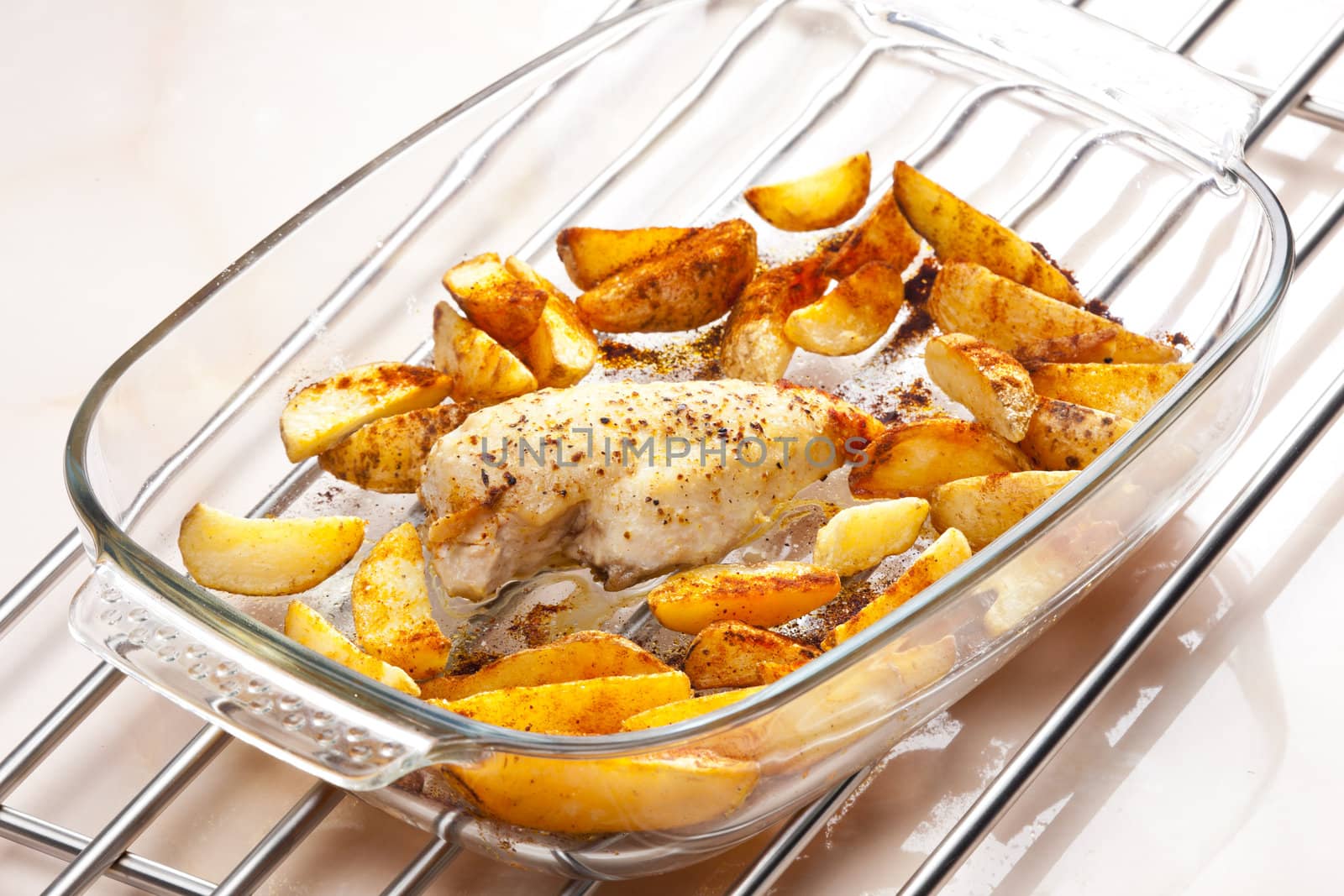 turkey meat on pepper baked with American potatoes