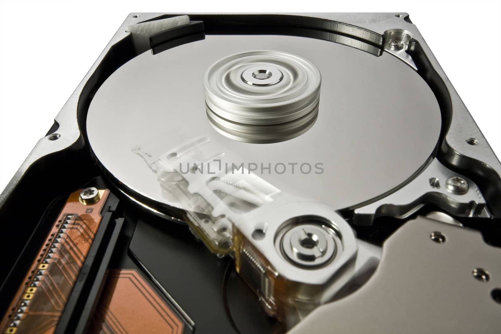 rotating hard disk on white in extreme perspective with moving read write head