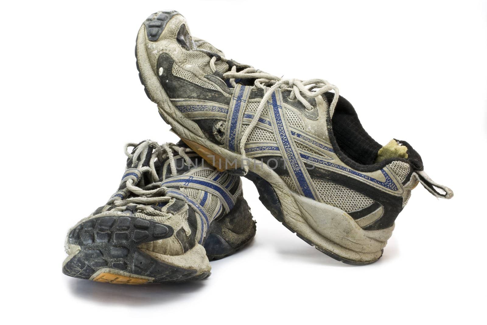 old sports shoes in white background