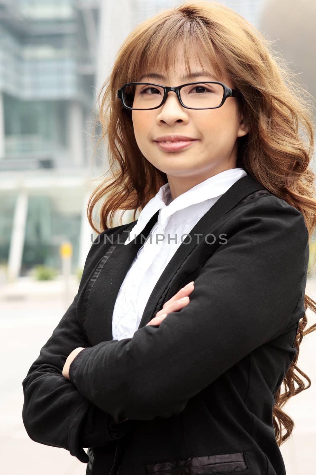 Great smiling outdoor young executive 
