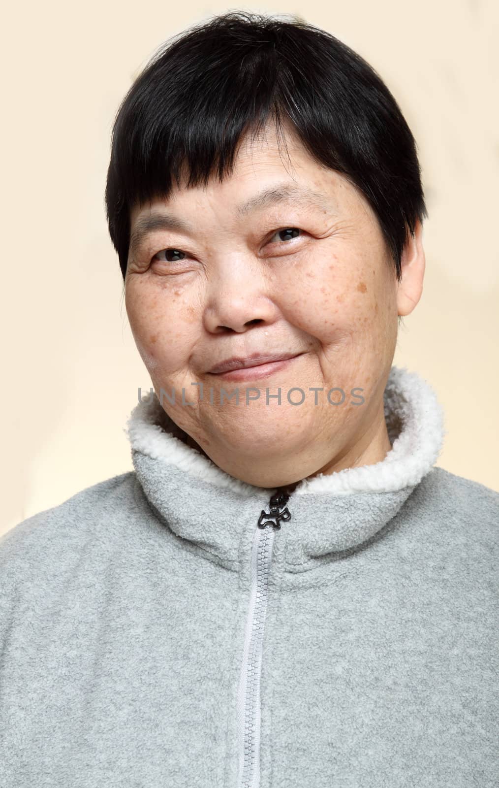 60s Senior Asian Woman  by cozyta