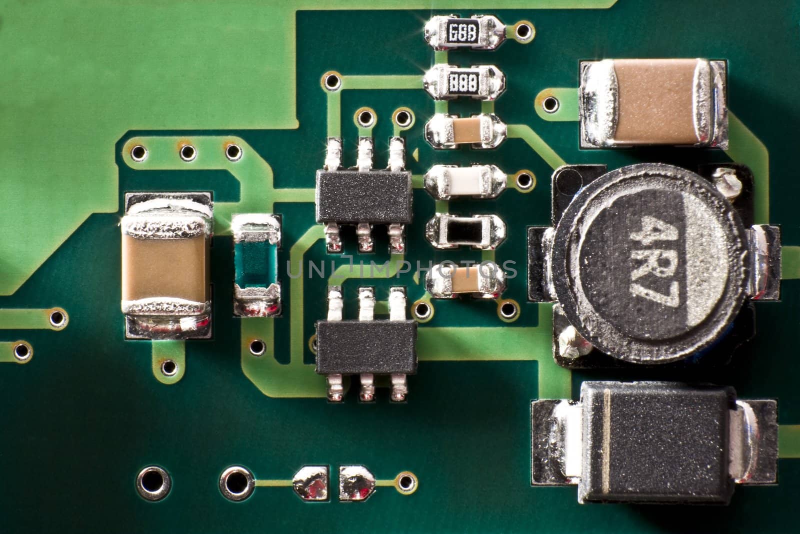 green circuit board with different components