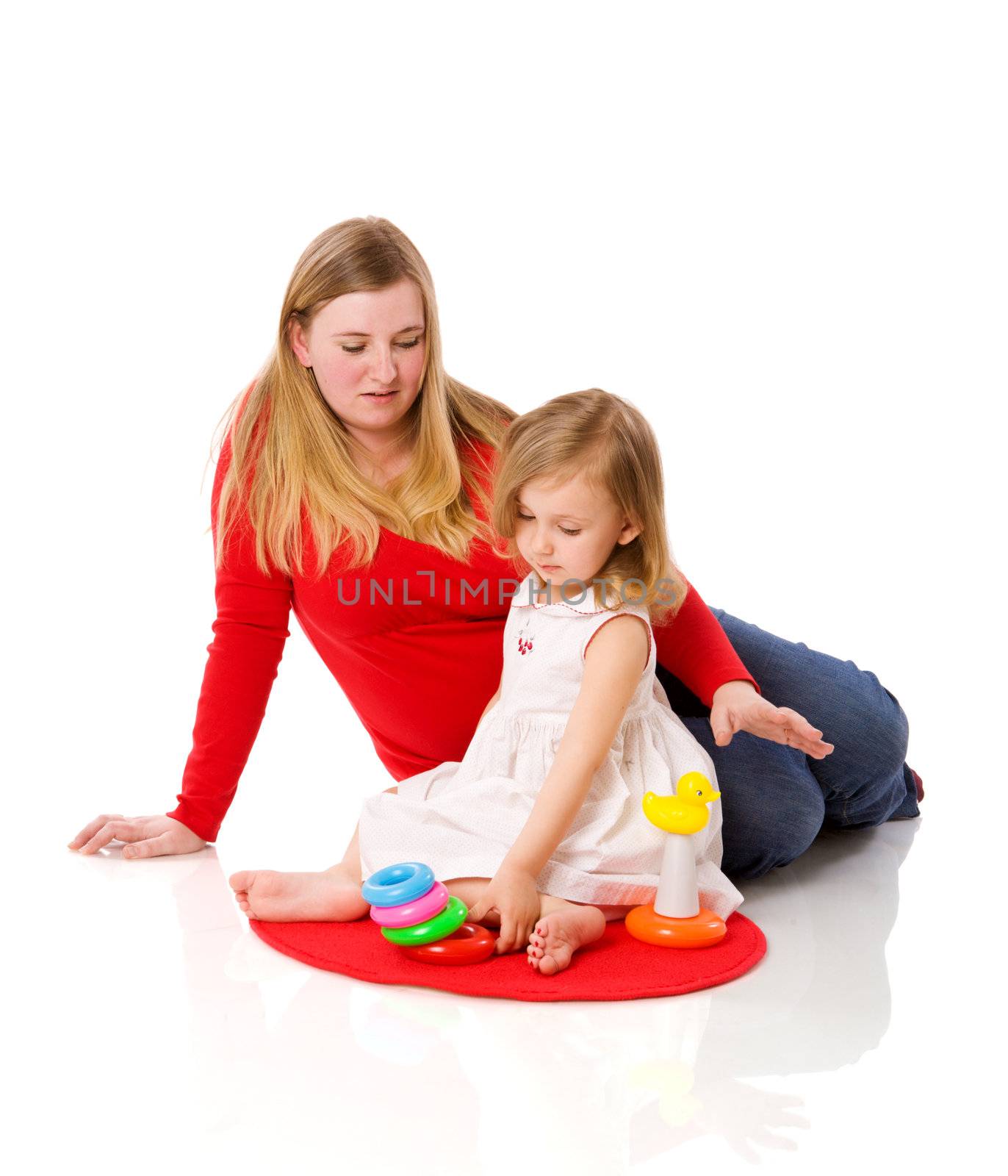 mother and daughter playing together isolated on white
