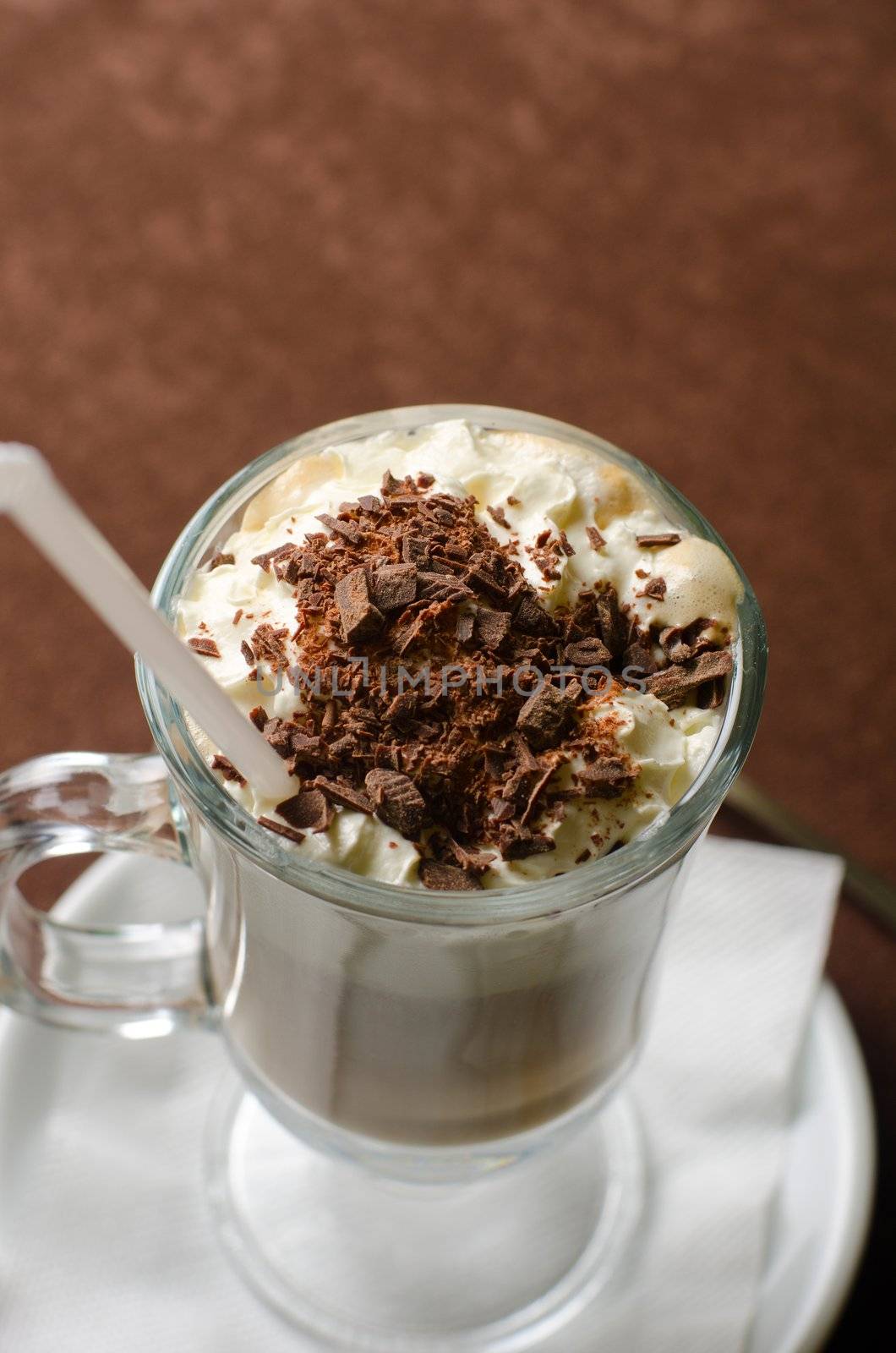 Closeup photo of latte cup at table