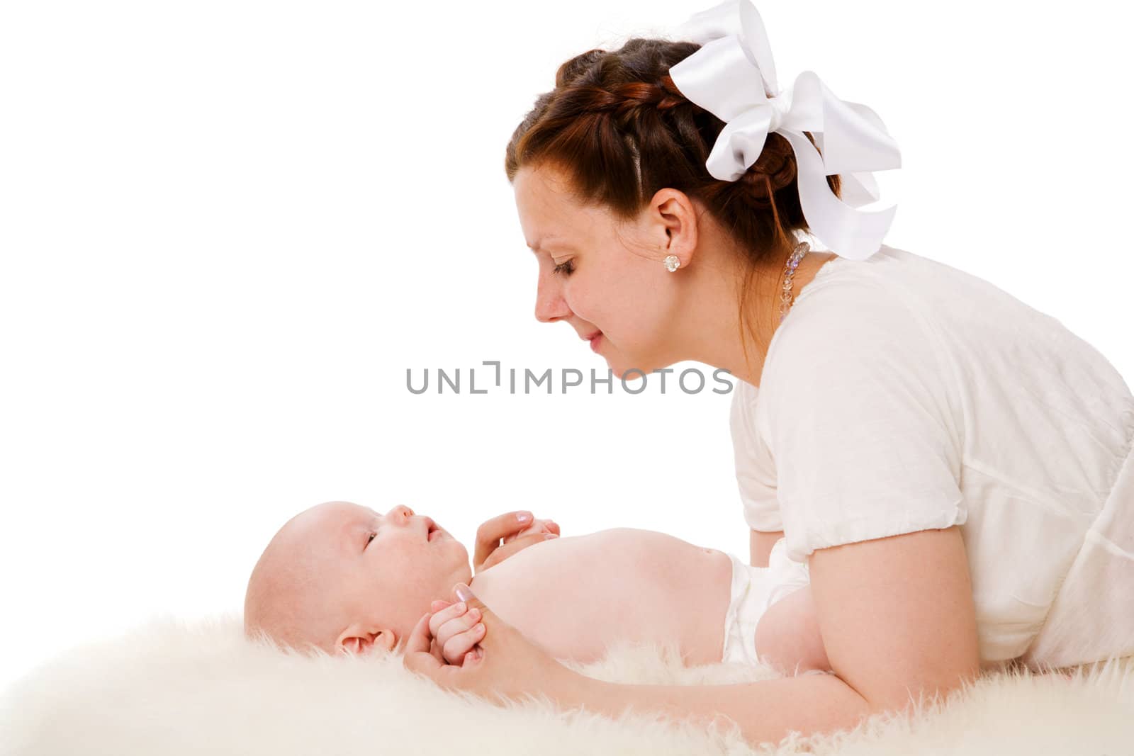 Happy mother holding her baby closeup portrait