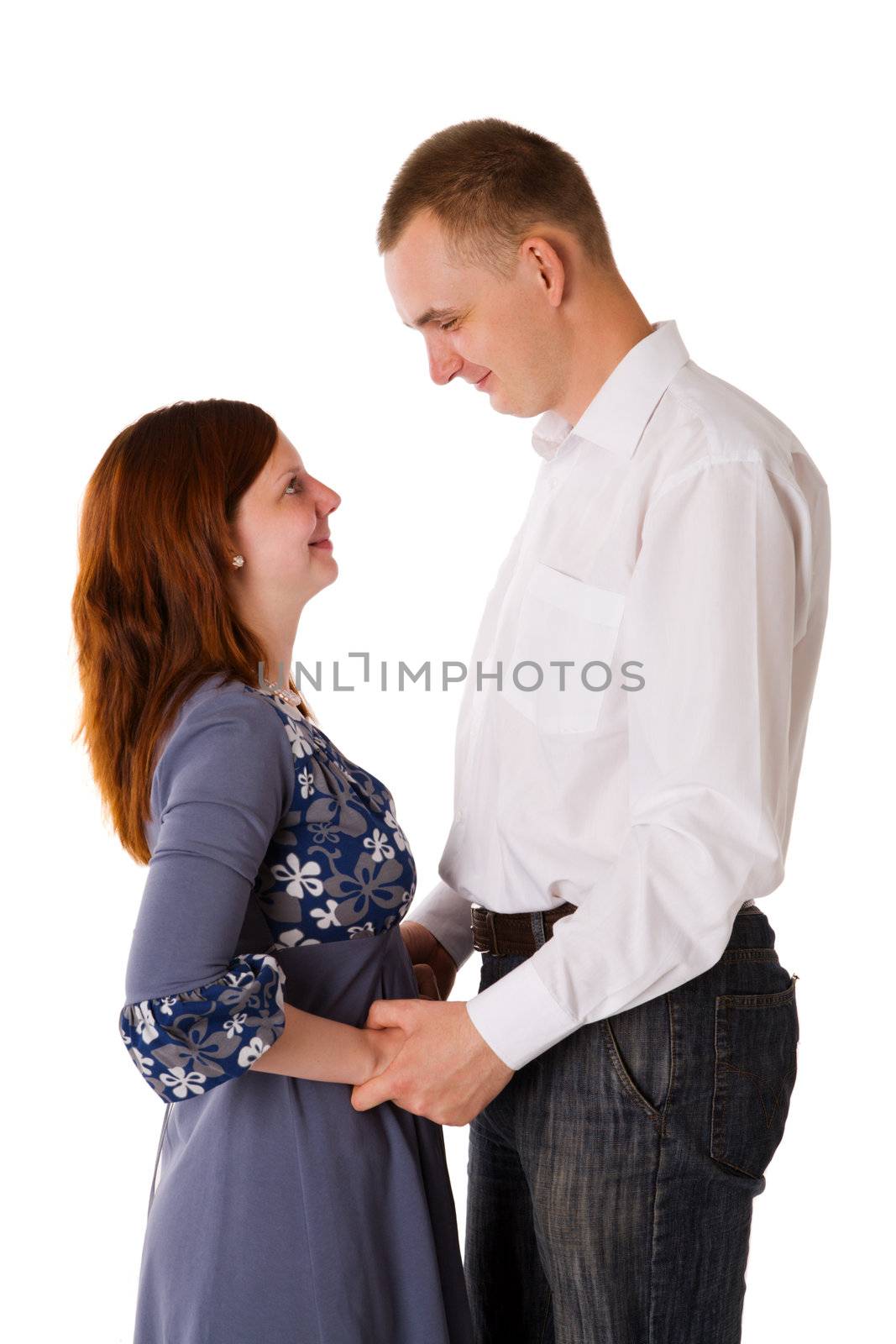 Happy married Couple smiling isolated on white