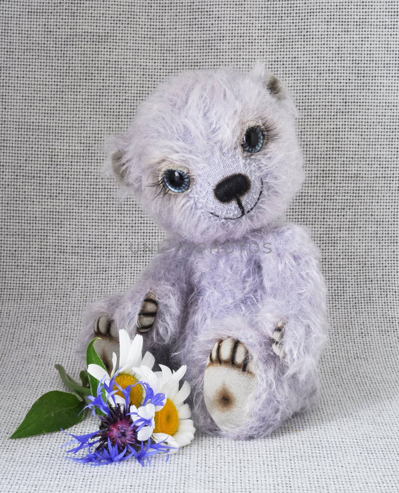 Lilac teddy-bear with a bunch of by alexcoolok