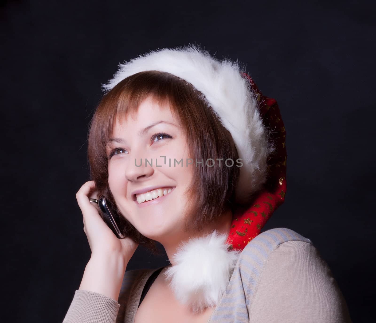 young woman in christmas cap by Discovod