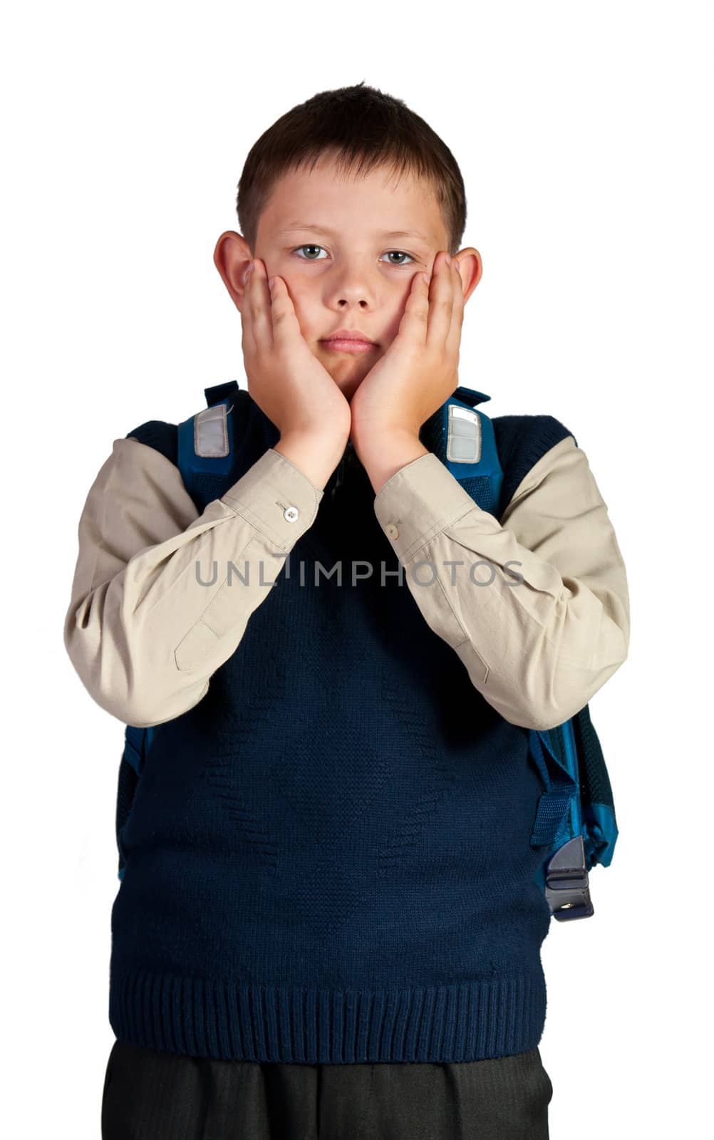 Schoolboy. Isolated over white background. The boy is dressed in a vest.