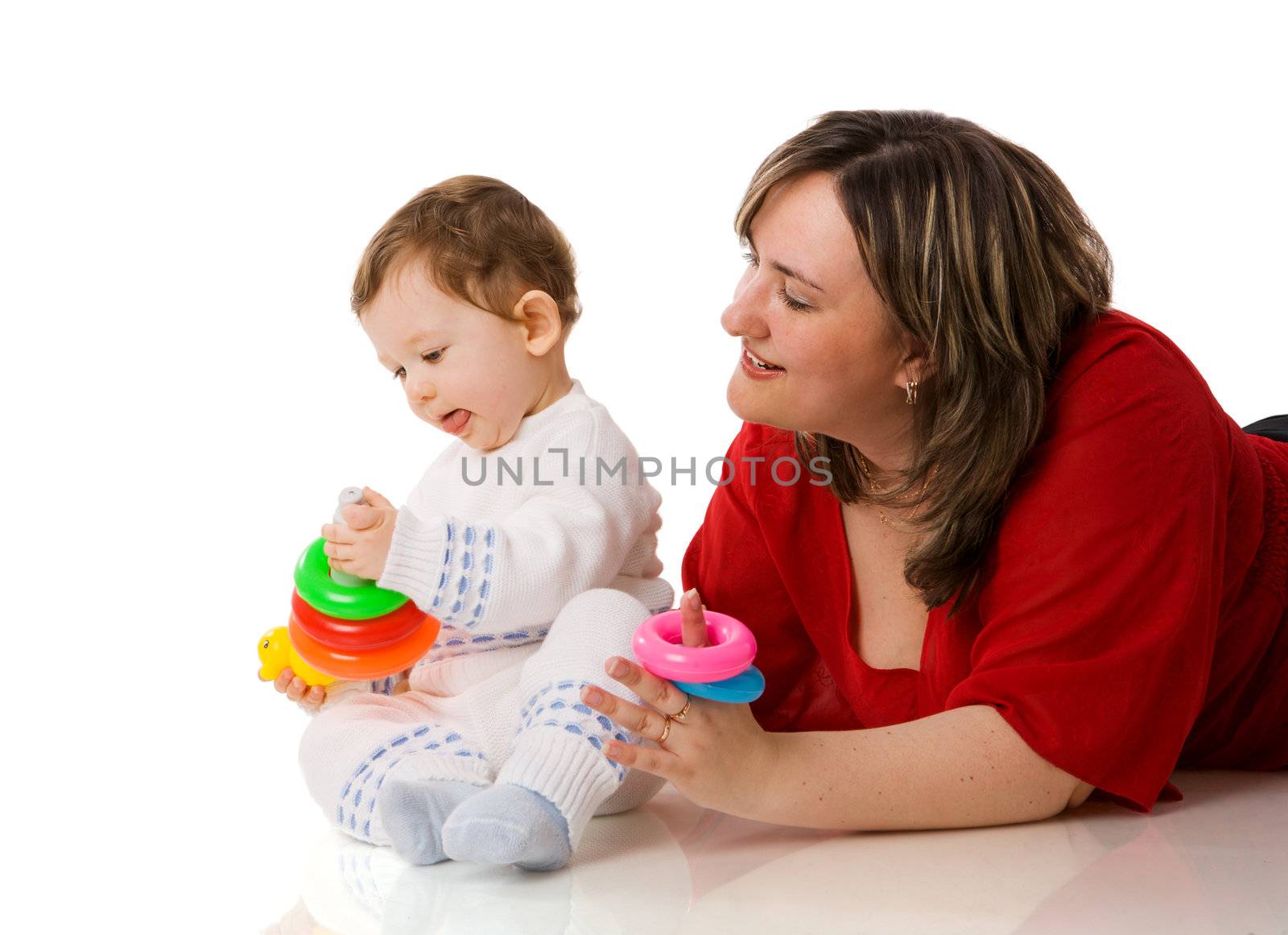 Mother playing with child holding pyramid isolated on white