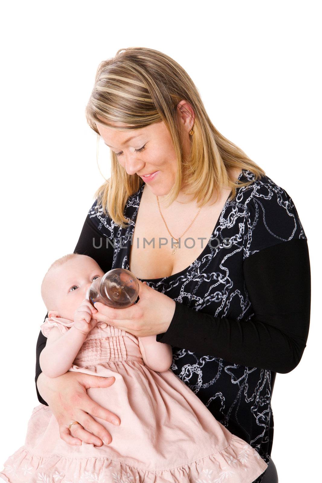 Mother feeding baby from bottle isolated on white