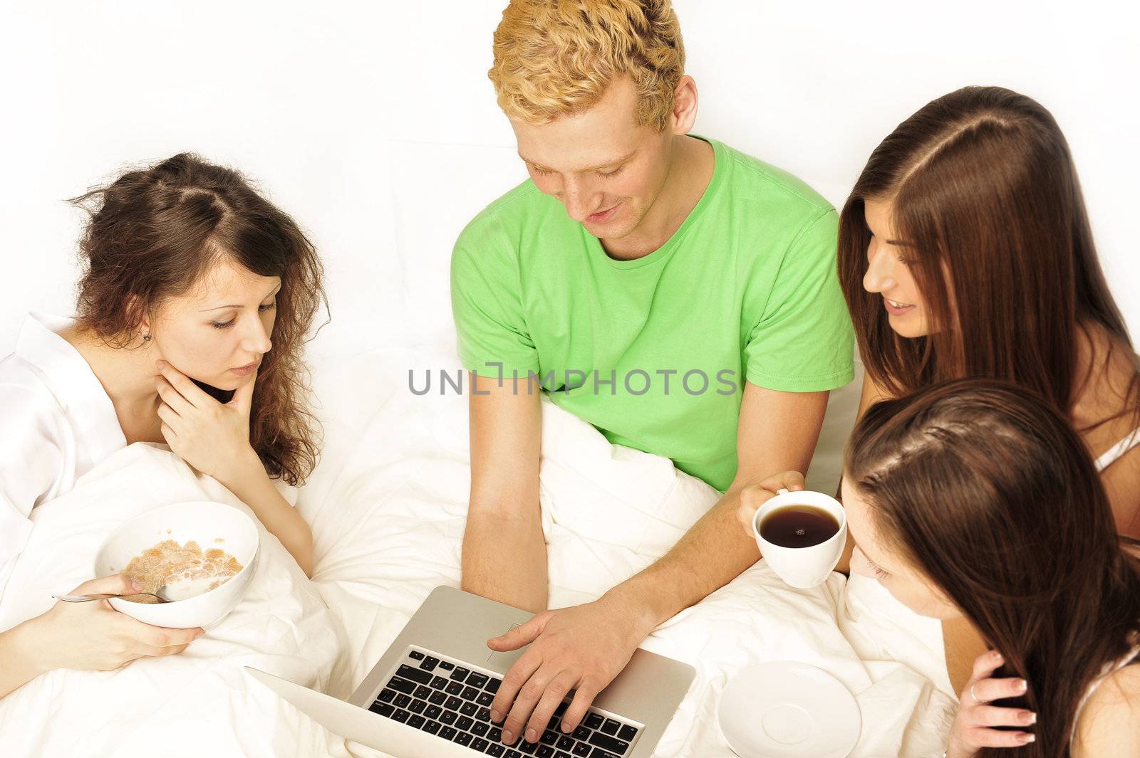 young man spending his morning with young girls     