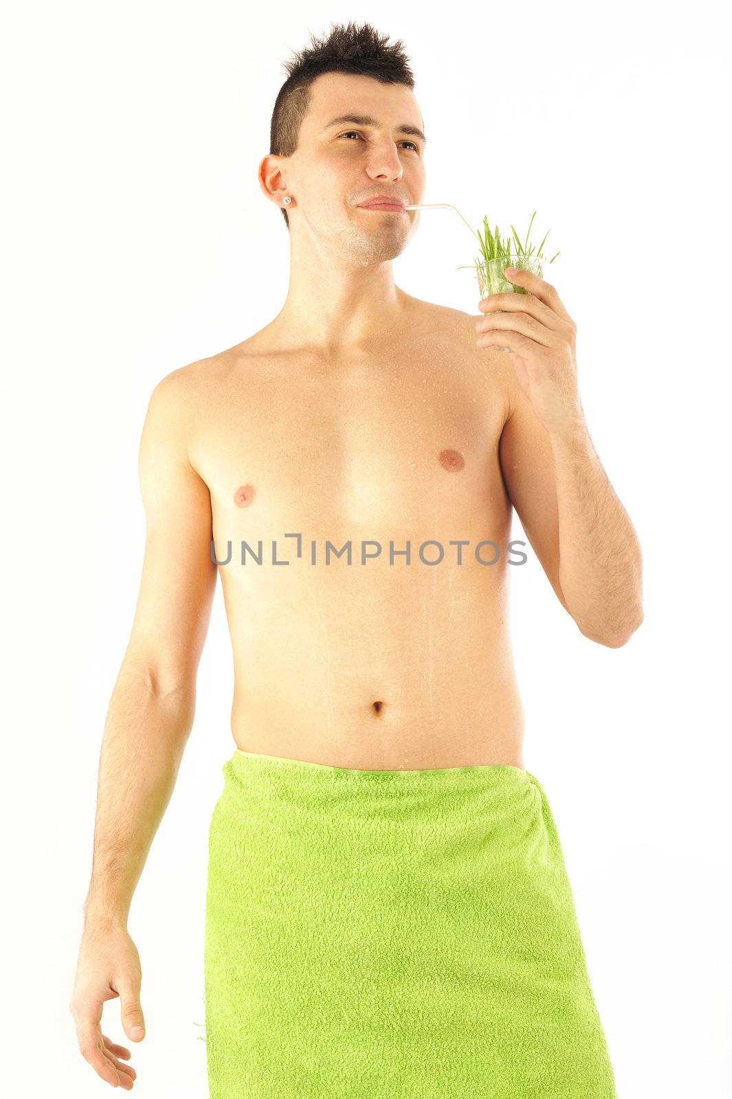 Portrait of man having grass cocktail symbolizing healthy food