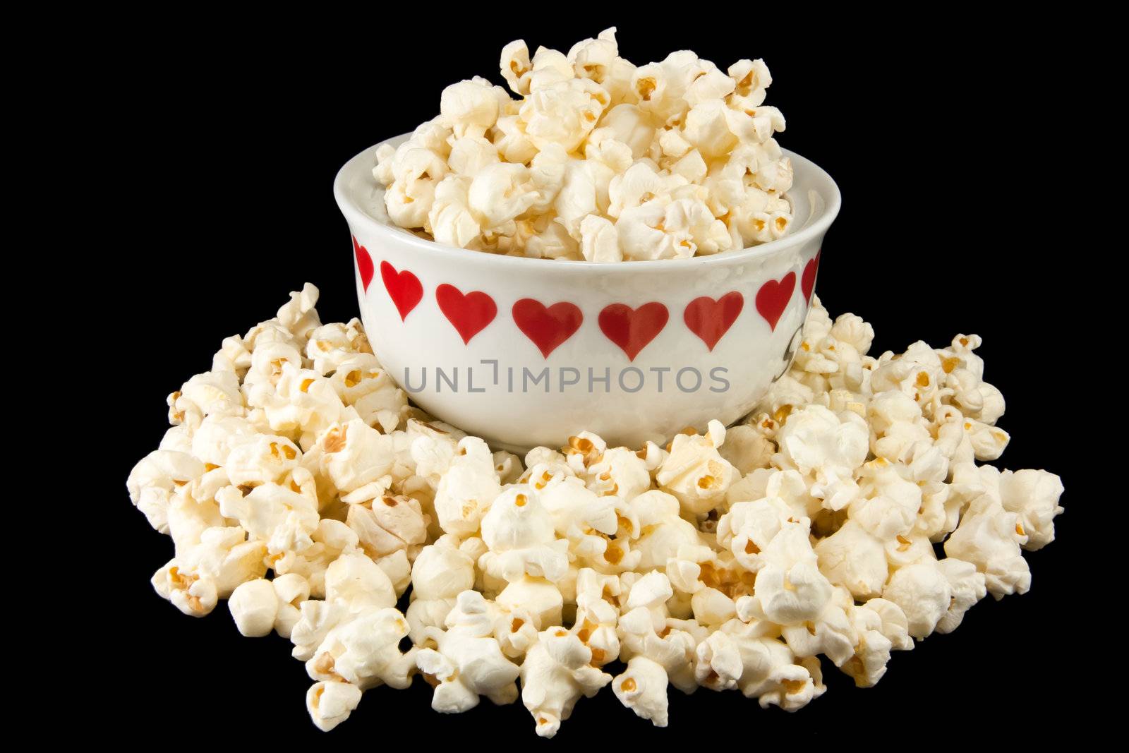 Popcorn in a heart bowl by Stootsy