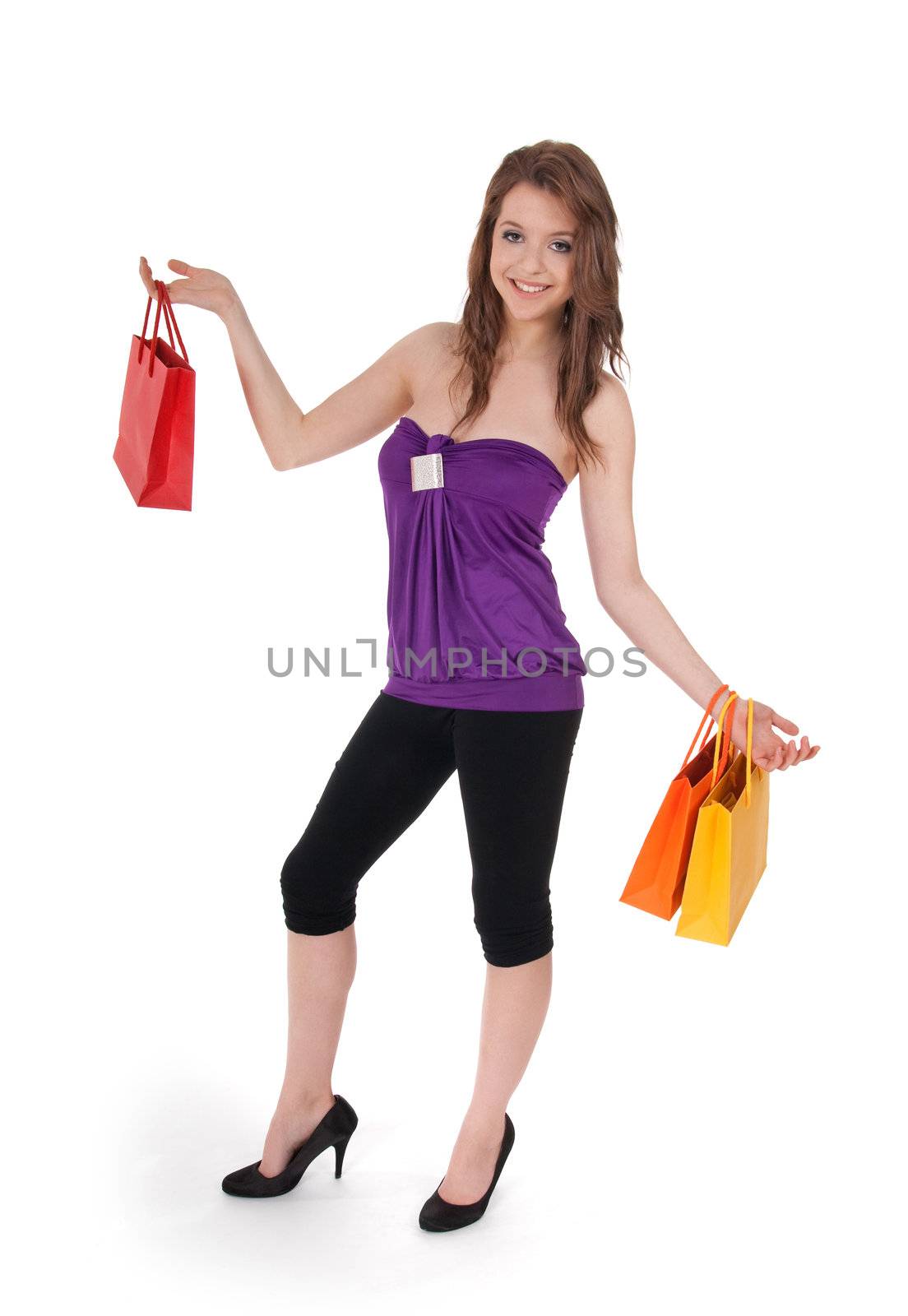 Pretty girl with colorful shopping bags by anikasalsera