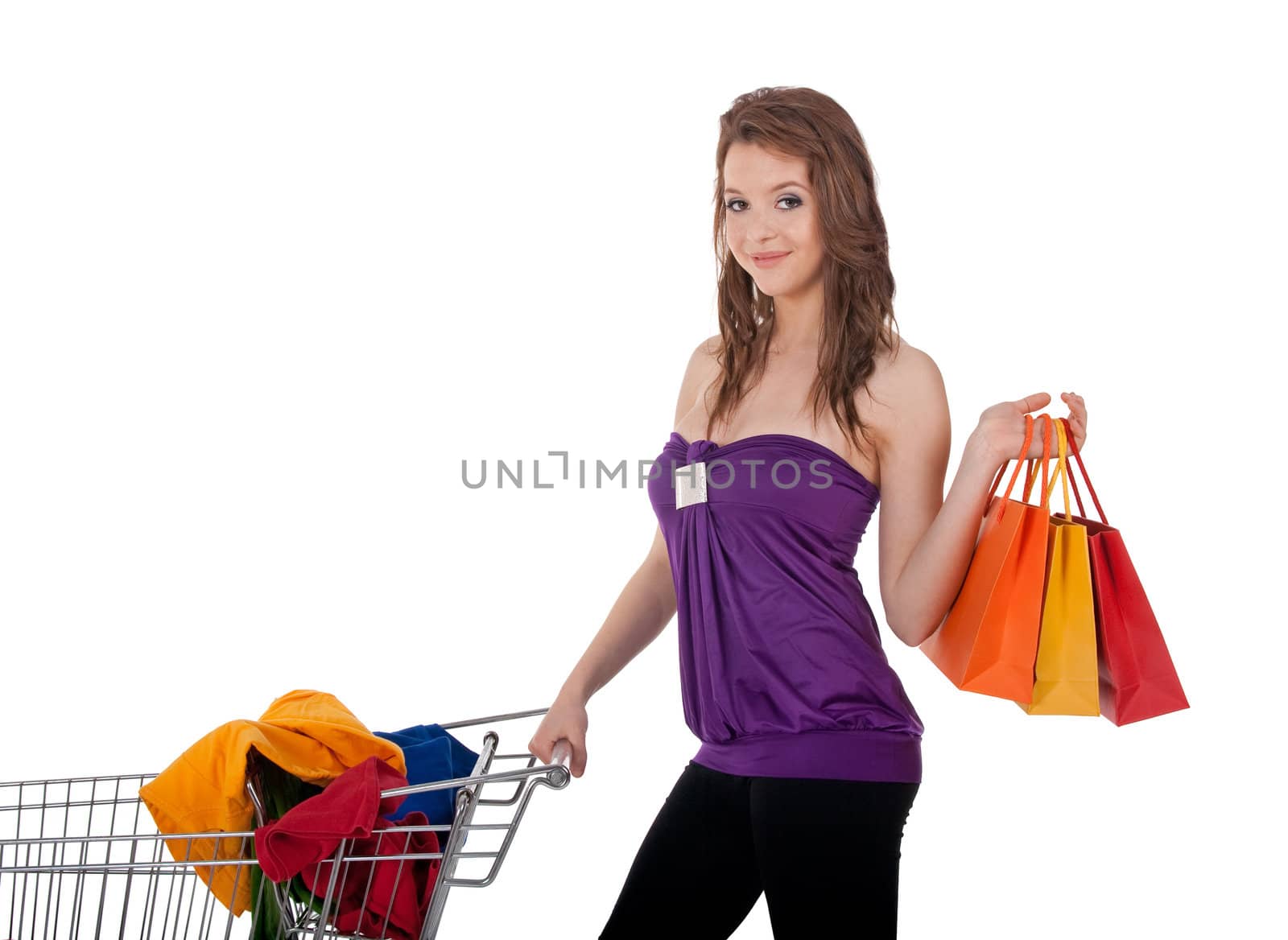 Girl with colorful shopping bags buying clothes by anikasalsera