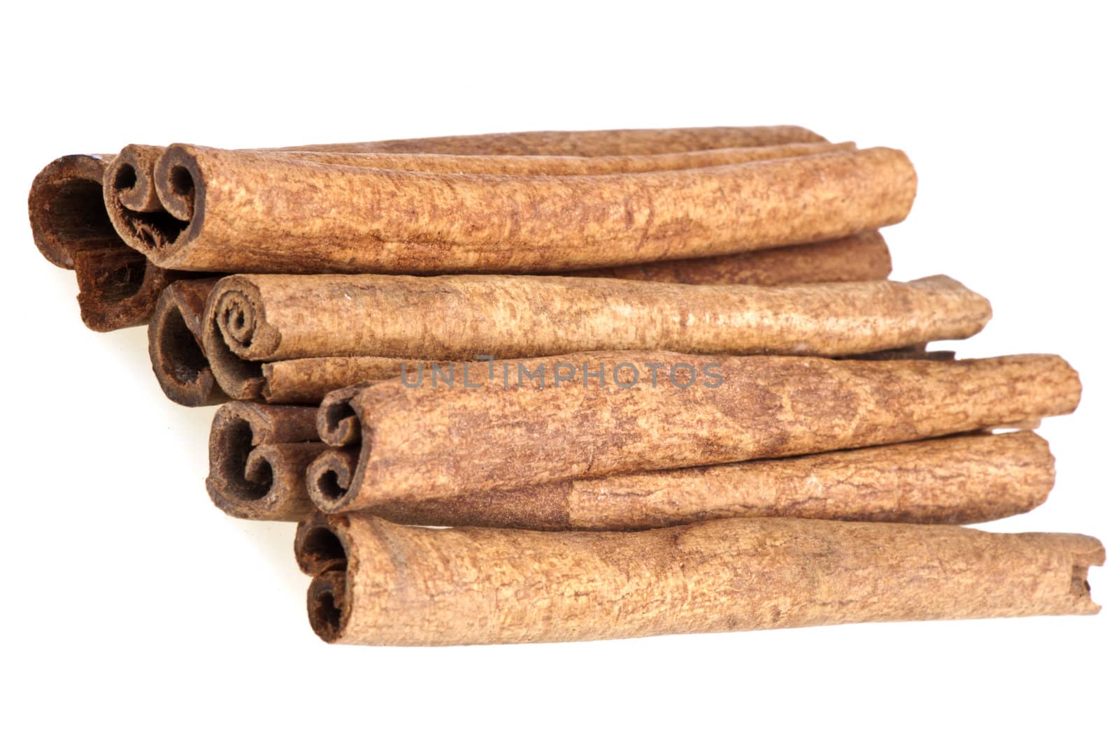 some cinnamon sticks on a white background