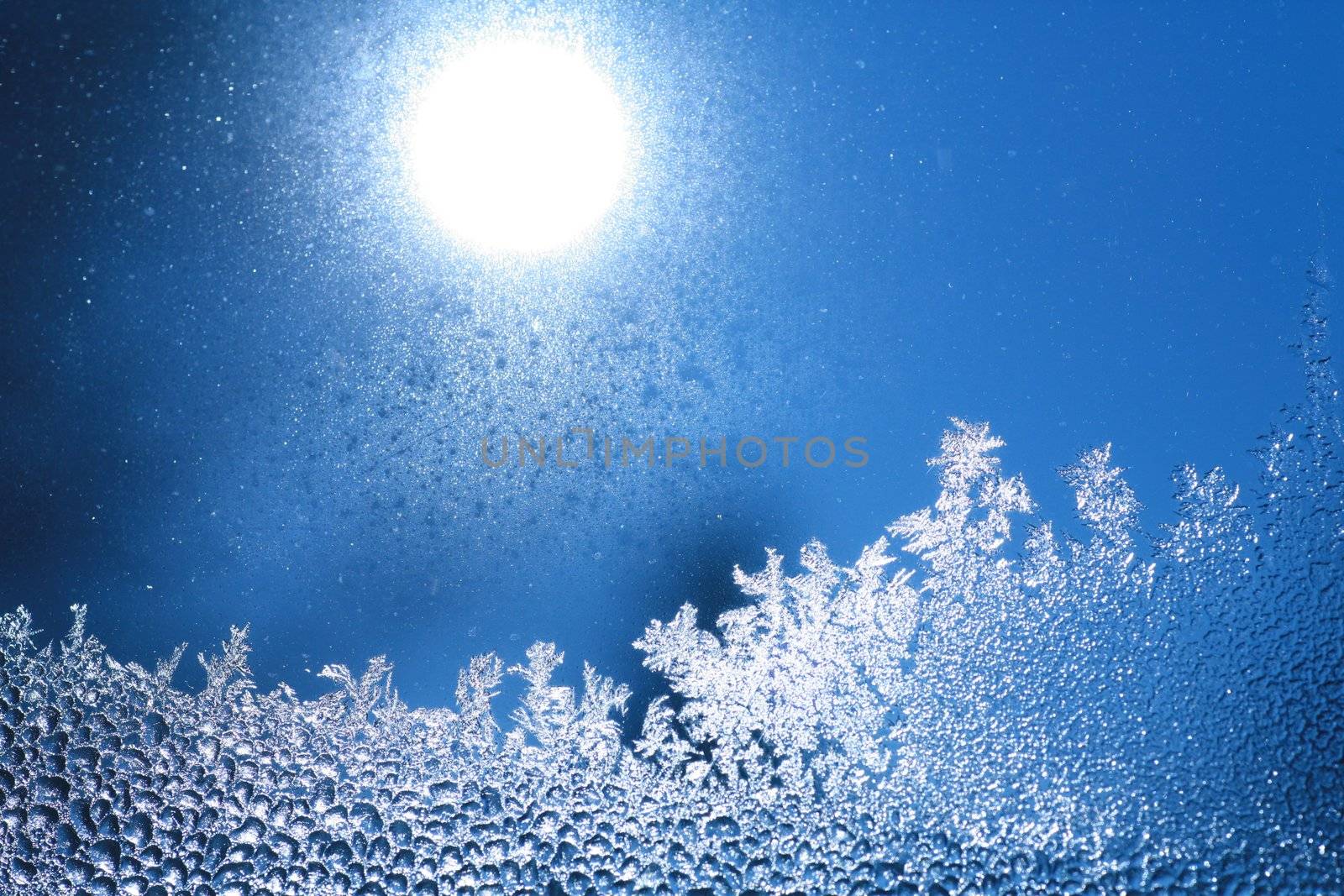 The patterns made by the frost on the window (hoarfrost background)