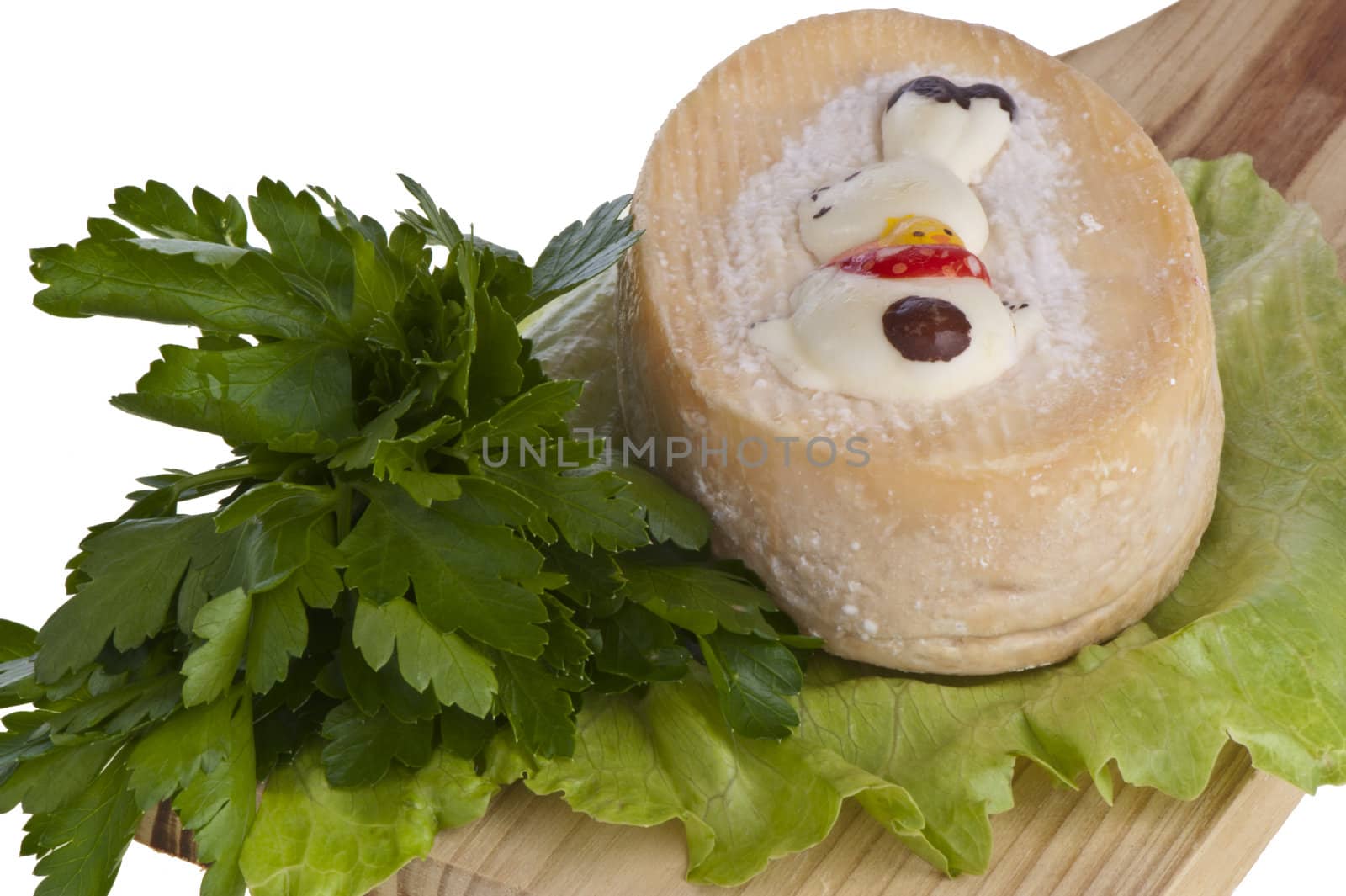 Small portion of goat cheese flavored with herbs and spices