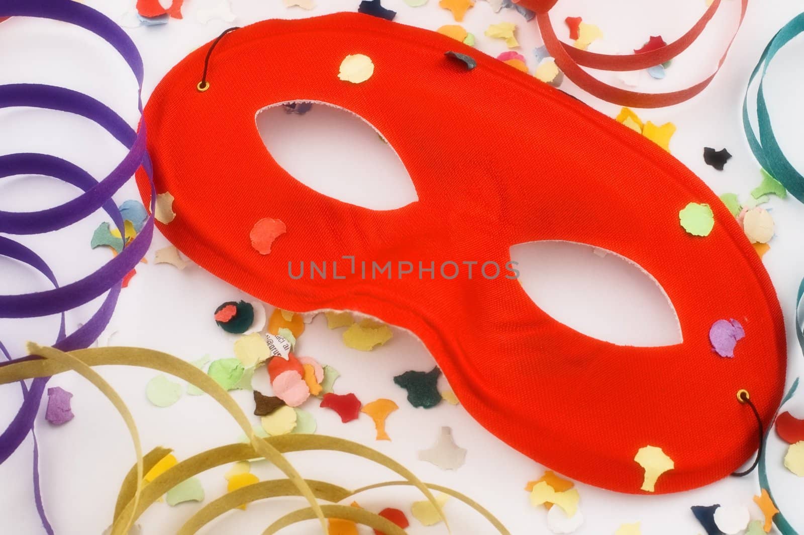 Red mask with confetti and streamers by sil