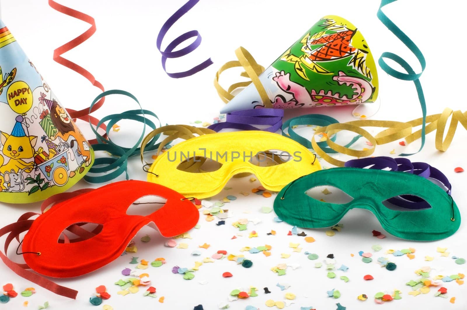 Masks with confetti, streamers and party hats with slight diffuse effect