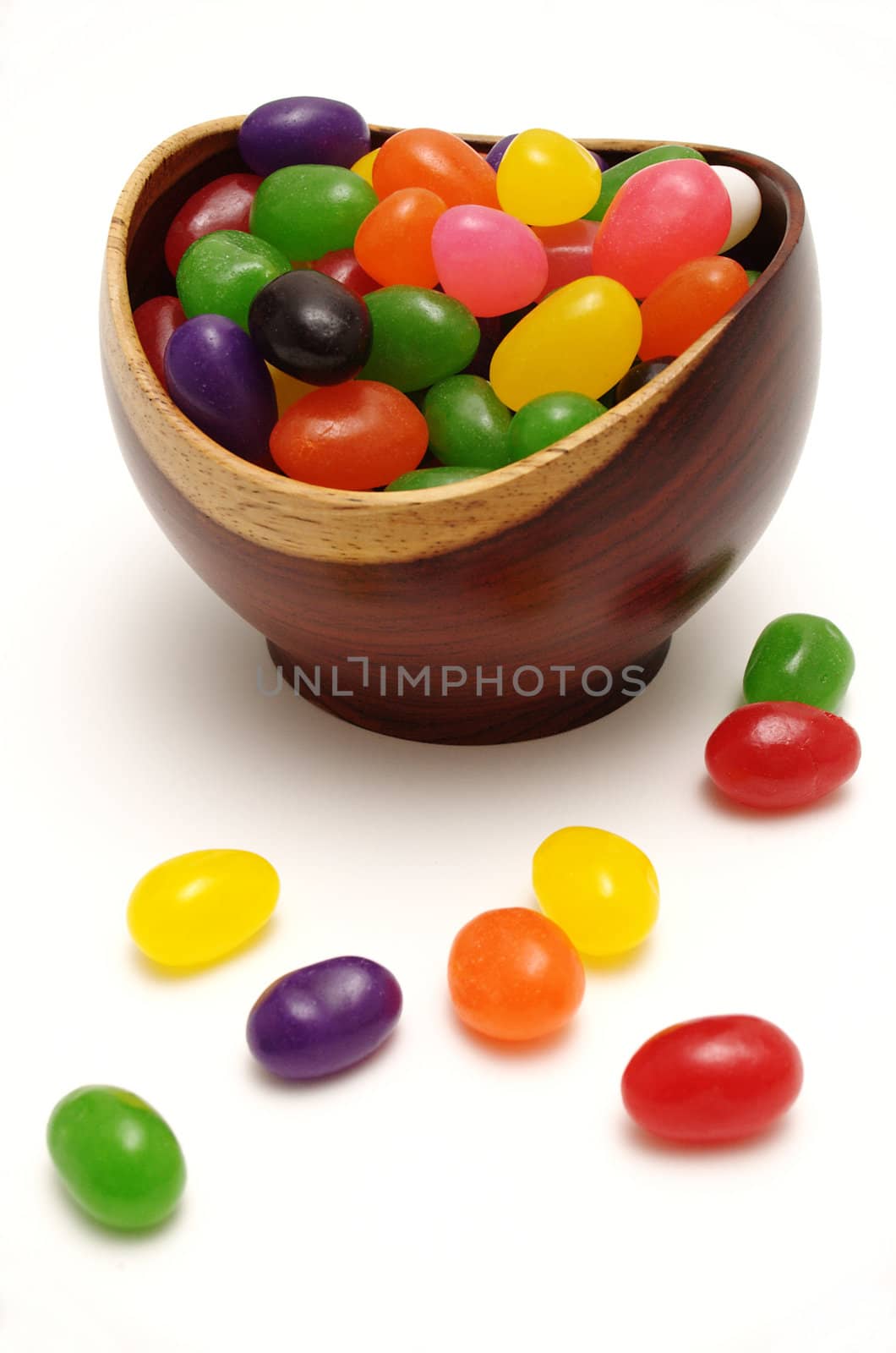 Jelly beans in a rosewood bowl by paulglover
