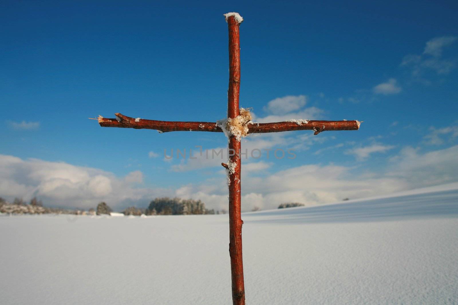 Cross in winterscene