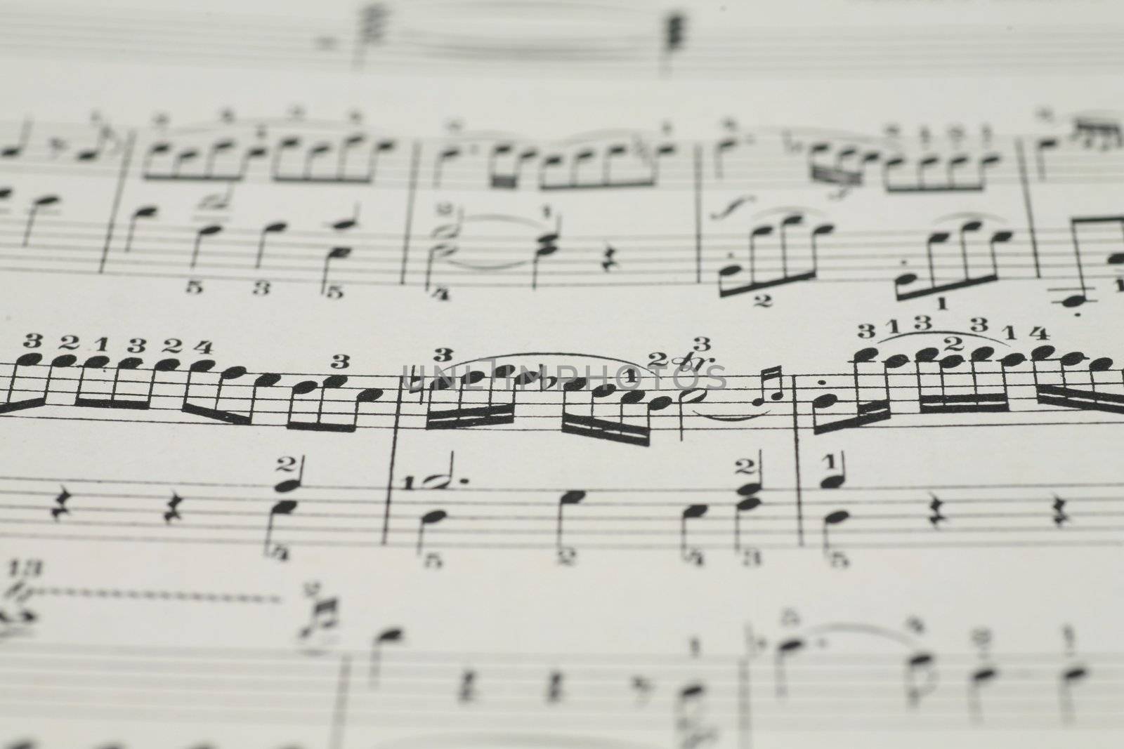 close-up of an old music sheet, very shallow DOF!