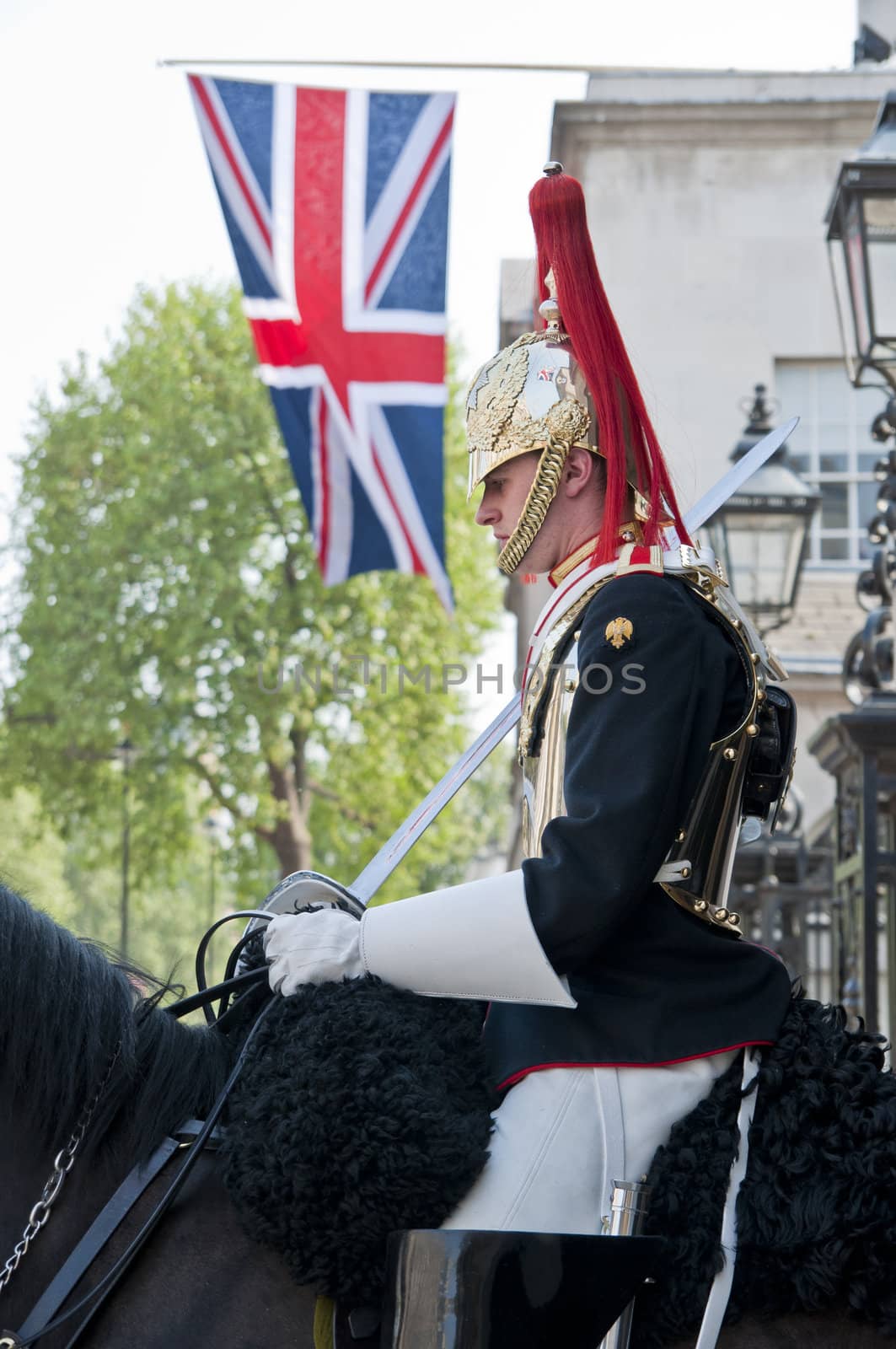 London, England - April 24, 2011: A mounted horse guard stands guards outside the horse guards parade in London.